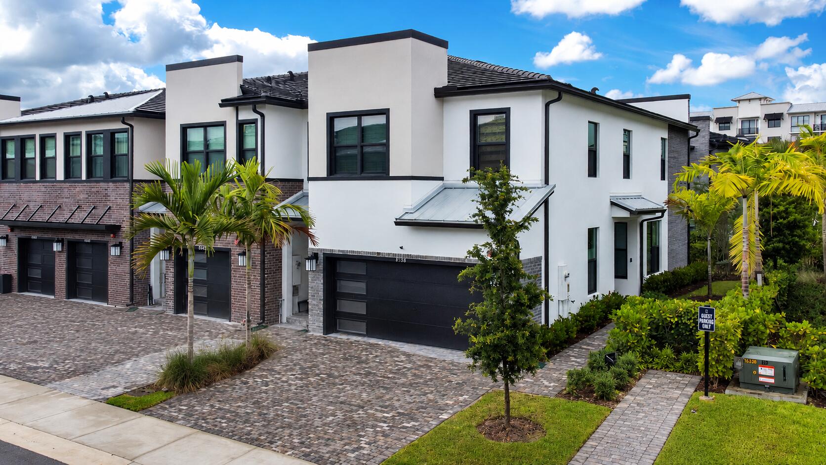 Welcome to this upgraded 2024 corner-unit townhome in gated Emory. Built by Pulte Homes, this 3-bedroom, 2.5-bath home offers a bright open layout with pool views and abundant natural light. The first floor features tile flooring, spacious living/dining areas, and a modern kitchen with stainless appliances, large island, custom pantry storage and drawer organizers. Upstairs, the primary suite includes a custom walk-in closet and ensuite bath. All bedrooms feature walk-in closets. Highlights include impact windows and doors, tile roofing with metal accents, a 2-car garage, driveway parking, nearby guest parking, and added corner-unit privacy. Community amenities include a pool, BBQ area, and dog park. Near shopping, dining, major highways, American Heritage Schools, and FLL Airport.