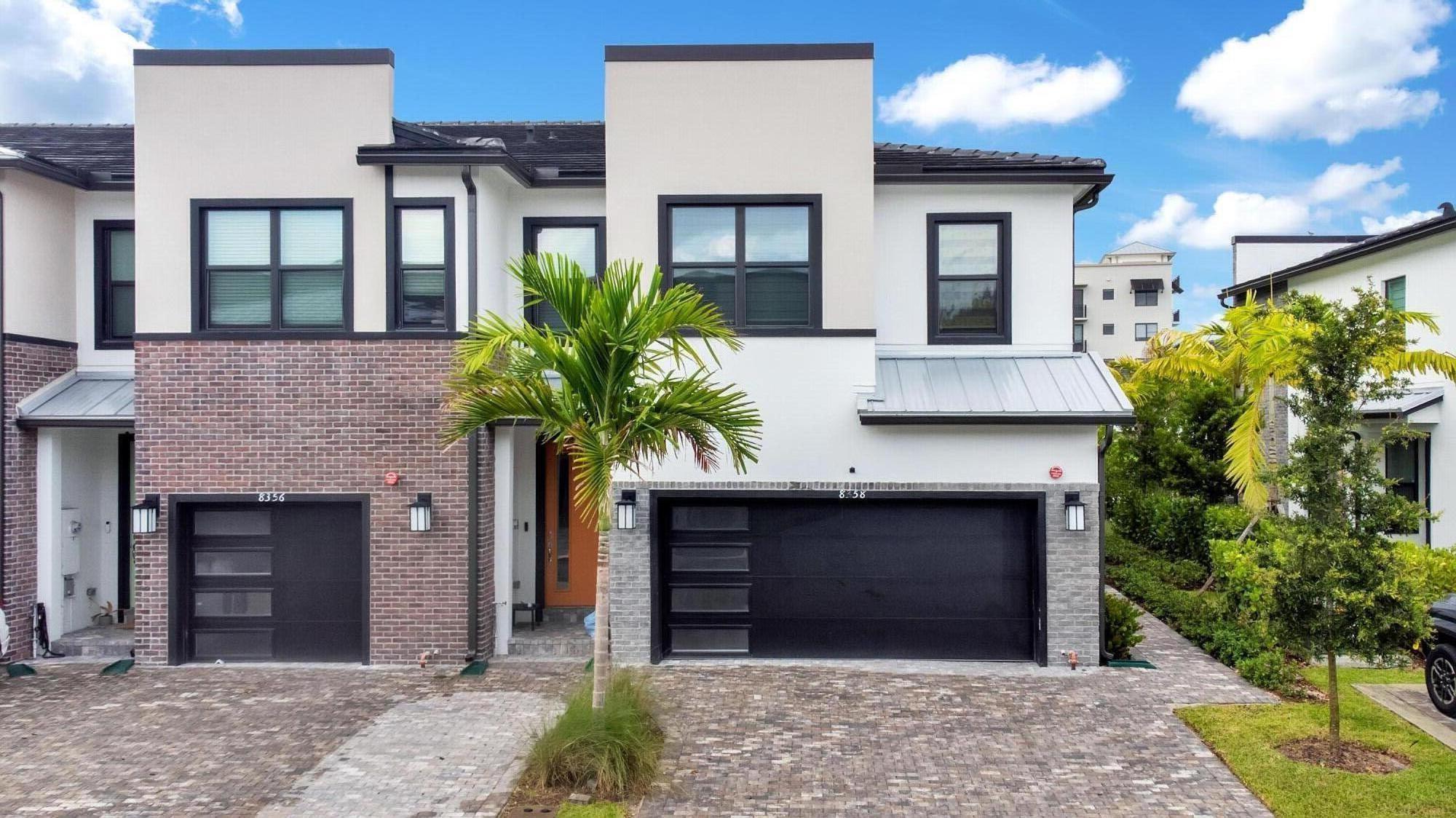 Welcome to this upgraded 2024 corner-unit townhome in gated Emory, Plantation. Built by Pulte Homes, this 3-bedroom, 2.5-bath home offers a bright open layout with pool views and abundant natural light. The first floor features tile flooring, spacious living/dining areas, and a modern kitchen with stainless appliances, large island, customized pantry storage, and built-in drawer organizers. Upstairs, the primary suite includes a custom walk-in closet and ensuite bath. All bedrooms feature walk-in closets. Highlights include impact windows/doors, metal roof, 2-car garage, driveway parking, nearby guest parking, and added corner-unit privacy. Community amenities include a pool, BBQ area, and dog park. Near shopping, dining, major highways, American Heritage Schools, and FLL Airport.