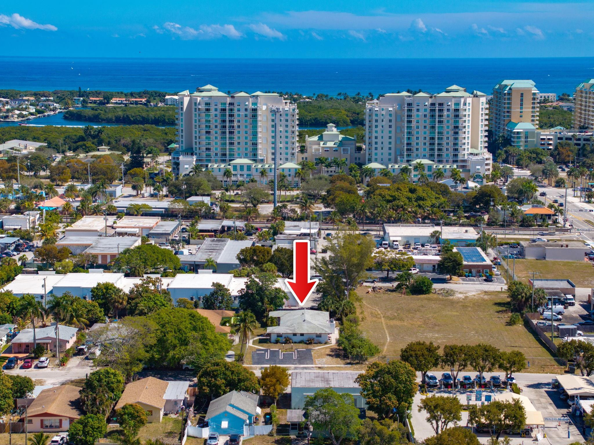 Positioned within Boynton Beach’s downtown redevelopment district, this income-producing duplex sits directly across from the newly completed City Hall & Library Complex, surrounded by new residential & retail projects underway & planned. The property features 2 spacious 2-bedroom, 2-bath units updated in 2017 with renovated kitchens, bathrooms, flooring, appliances & central A/C systems, each offering a private outdoor patio. A shared laundry area includes a newer washer & dryer. The oversized, fenced lot provides ample parking, with the driveway re-asphalted & striped in 2022, & no HOA. Conveniently located near I-95, Ocean Ave, downtown Boynton Beach & the beach, this property offers immediate rental income with strong long-term upside.