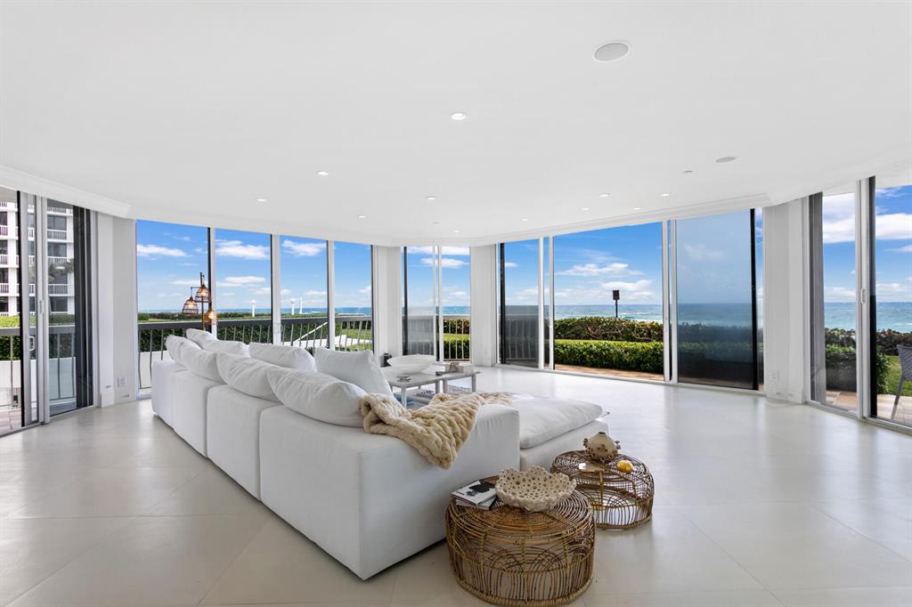 Live the Palm Beach lifestyle with breathtaking direct wrap-around ocean views from every room. This is a rare opportunity to have the very best access to the gorgeous Palm Beach coast line. With 9ft ceilings and just over 3100sqft of living space, this MOVE-IN READY light, bright and white, first floor 3 bedroom 3 1/2 bathroom oceanfront condo with direct beach access offers everything you could dream of. Sloans Curve is a full-service luxury building featuring all of the desired amenities; 24/7 manned gate and security, Doorman, Pool, Fitness Center, Private Beach Access and Services, 6 Tennis Courts and Garage parking.