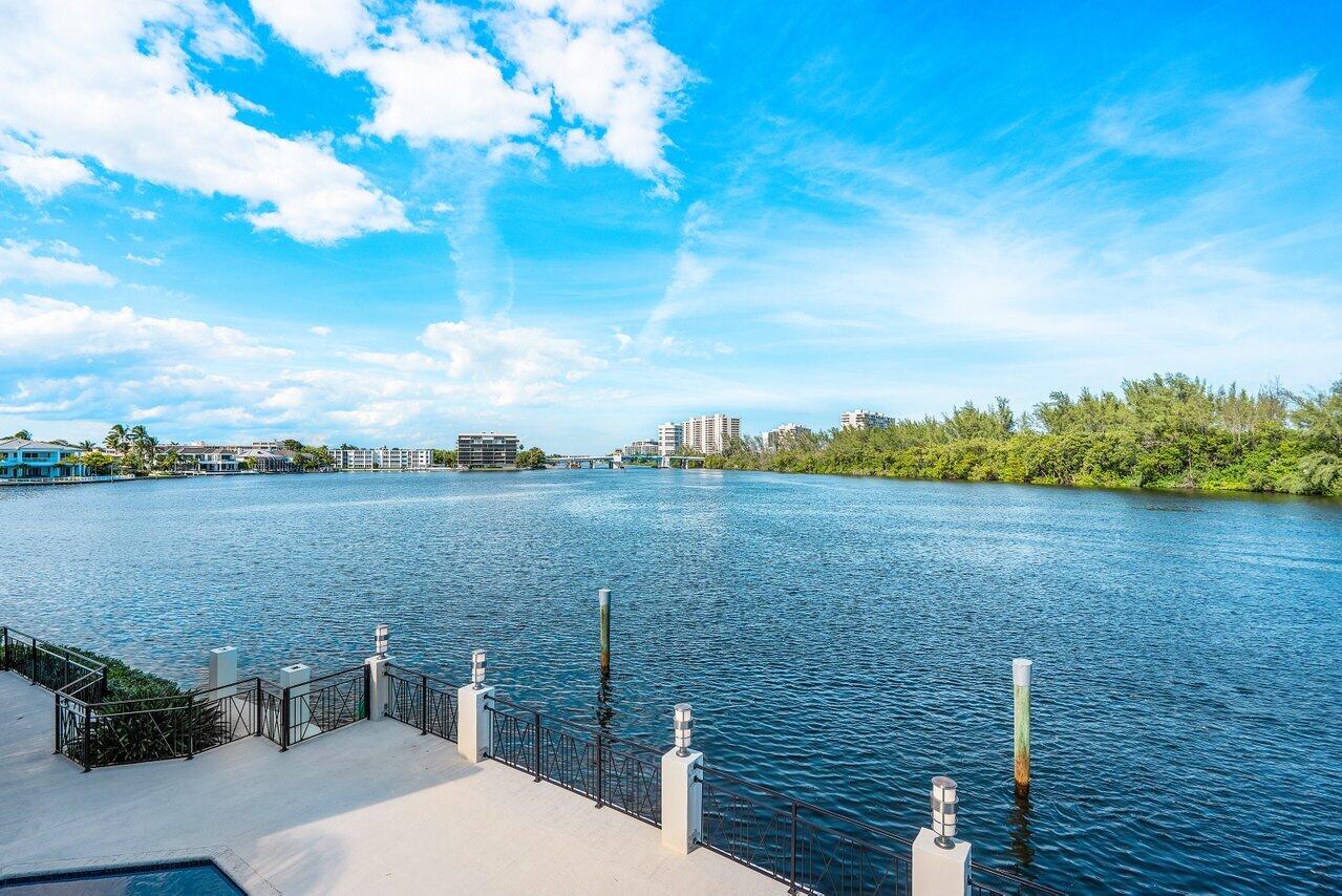 Once in a lifetime opportunity to own a property directly on the intracoastal with approximately 215' of waterfrontage, offering expansive, spectacular views to the east and north. This gated estate, located on an over 14,400 sqft cul-de-sac lot, overlooks Spanish River Park, a 94-acre pristine park, to the east. The view to the north overlooks shimmering Lake Rogers, one of the widest lakes of the intracoastal waterway. The view extends up the intracoastal to Highland Beach and beyond. This rare, highly desirable location offers complete privacy, exclusivity, and is unmatched for waterfront living and enjoyment. Lake Rogers is a community nestled along the intracoastal waterway, has several deep-water canals and is just over two miles from the Boca Raton inlet. With approximately 7000