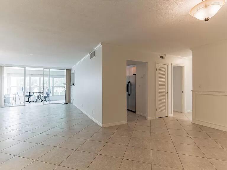 Discover the perfect blend of comfort and convenience this 2 bedroom, 2 bath condo nestled within a charming atrium-style community in the heart of Plantation. Enjoy an open floor plan, abundant storage, a spacious primary suite with a walk-in closet, and a full-length screened balcony perfect for morning coffee or evening relaxation.  Ideally located just off Broward Boulevard tucked away in residential area, you're minutes from Broward Mall, Golf Course, Plantation Walk, downtown Fort Lauderdale, major highways, shopping, dining, and parks. Ideal student commuting to several nearby colleges and universities. Enjoy the lifestyle of a prime location, this condo offers outstanding value and an unbeatable Plantation address.