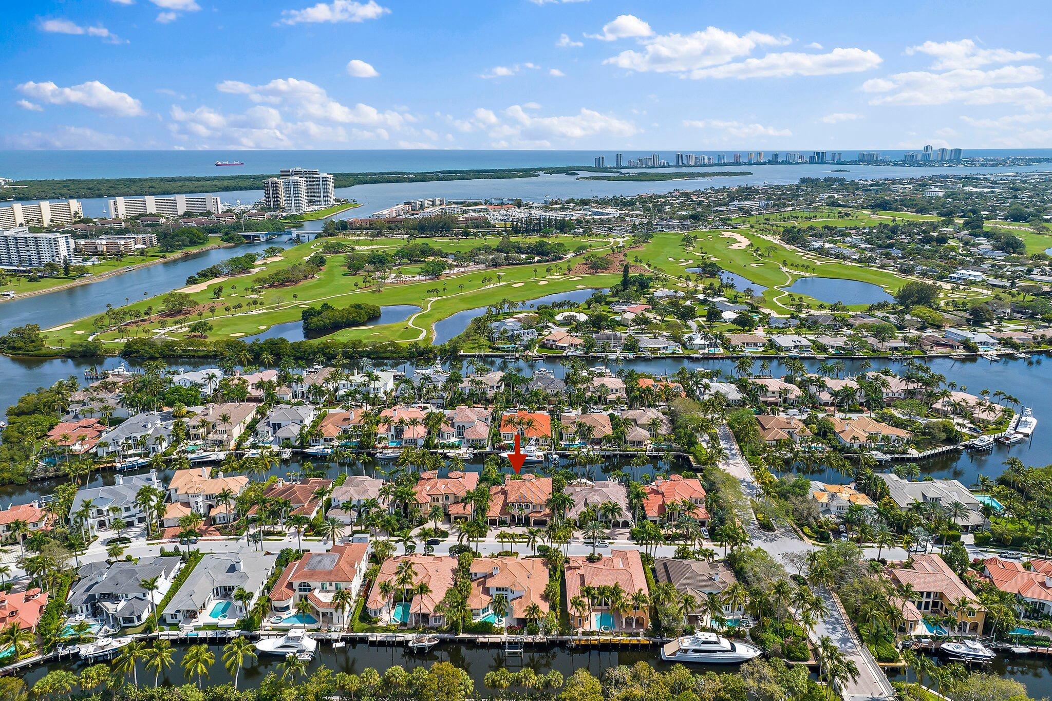 A rare opportunity to own one of the very few custom-built estates located on 100ft of water in the highly desirable gated community of Harbour Isles. This exceptional home boasts an open and spacious floor plan, making it the epitome of comfort and sophistication. From its convenient location to the meticulous details throughout, every aspect of this home has been designed to offer an exceptional living experience. As you step inside this dramatic custom home, you're greeted by 30 foot ceilings, adorned with incredible detailing that adds a touch of elegance to every room. The beauty of this Harbour Isles home extends far beyond its interiors. Step outside, and you'll find a stunning outdoor oasis located on a wide waterway making this home a true boater's dream!
