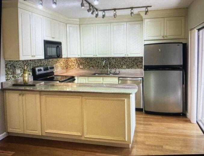 EMBASSY PARK CONDO UNIT 105 - Residential