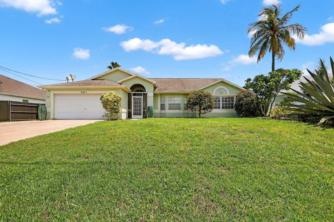 Welcome to the Florida lifestyle living. This beautiful, recently painted home has a huge outdoor space for entertaining with a gorgeous swimming pool! Walk out your back doors opening to a large backyard with a beautiful outdoor patio while you relax poolside. Lots of entertainment at this house. Featuring a spacious floor plan with indoor/outdoor entertaining space. This is a 3-bedrooms, 2-bathrooms, 2 car garage CBS home. Master bedroom has plenty of space with a master bath with a soaking tub and double sink. You'll enjoy a spacious living room, dining room and an A NEW KITCHEN. A large fenced in private backyard for privacy. This home is close to I-95 and your shopping and dining/entertainment.