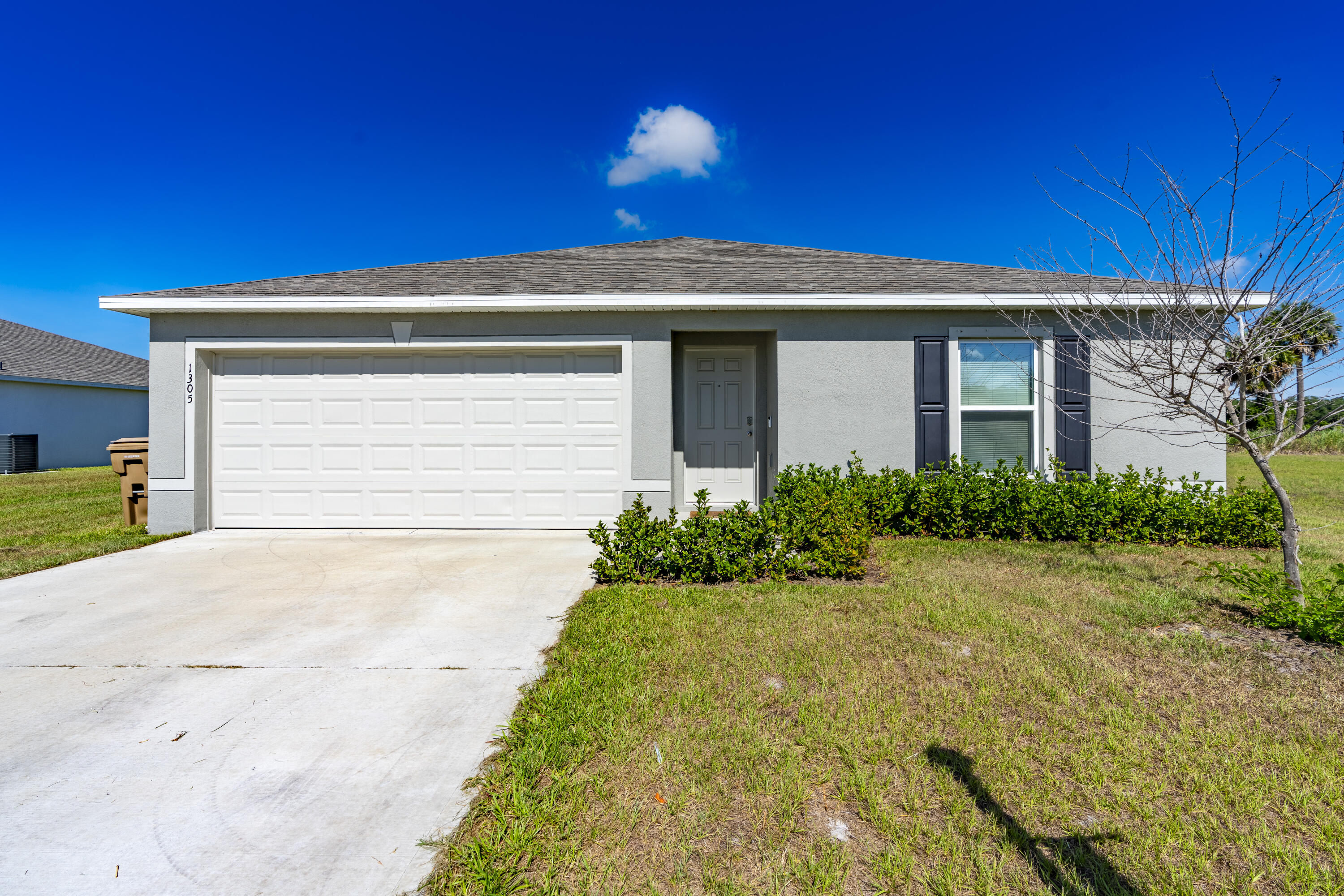 Welcome to this charming single-story residence located Okeechobee. This newly constructed home offers three bedrooms and two full bathrooms within  1,529 square feet of finished living space.