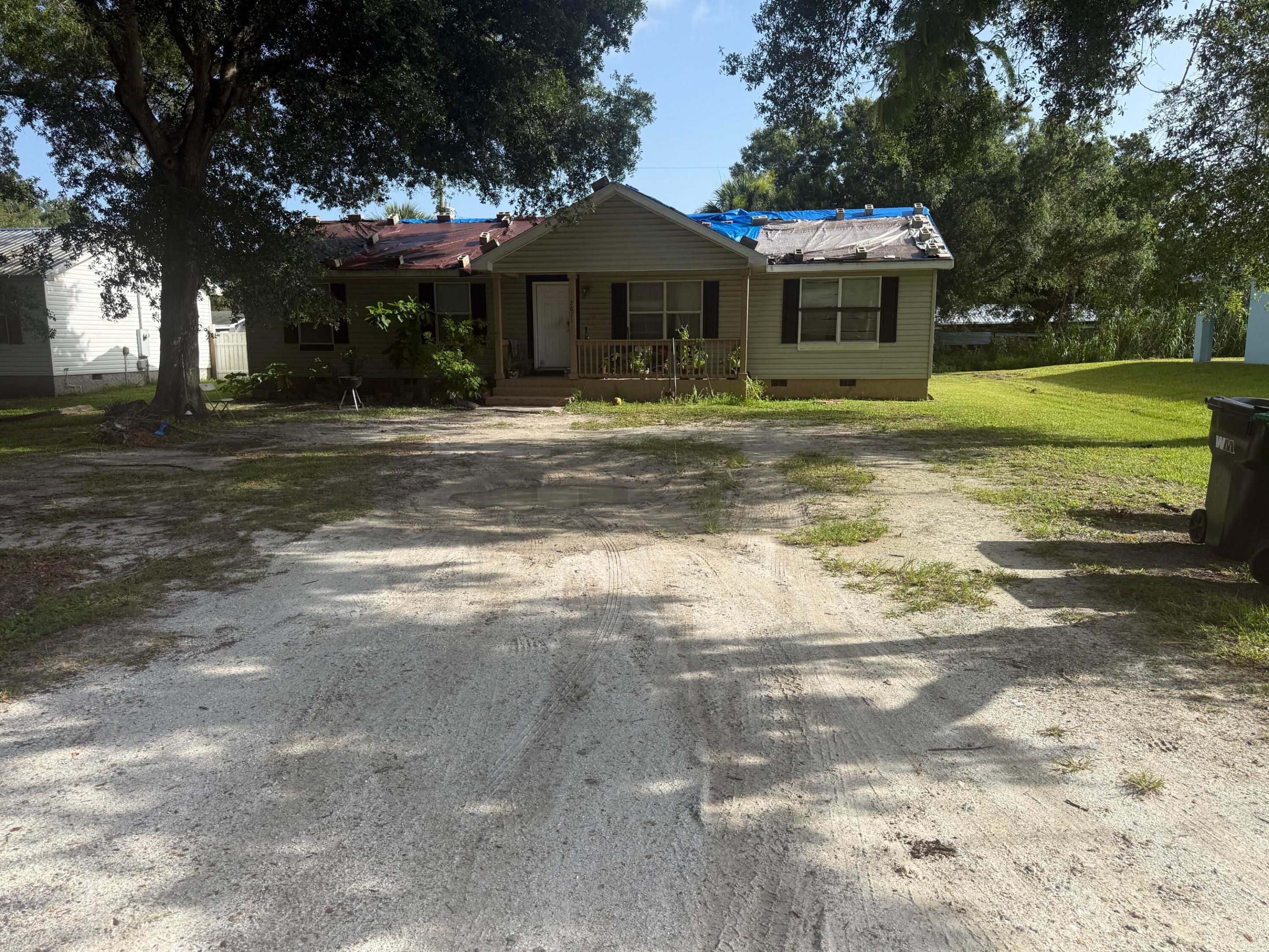 **Investor or Handyman Special!**  Great opportunity to transform this 4-bedroom, 2-bath home located within the city limits. Conveniently situated near grocery stores, convenience stores, and other everyday amenities, this property offers excellent potential as your next home or investment project.  This home is being sold **CASH ONLY** and is ideal for investors, flippers, or buyers looking to add their personal touch. Don't miss this chance to unlock the property's potential!