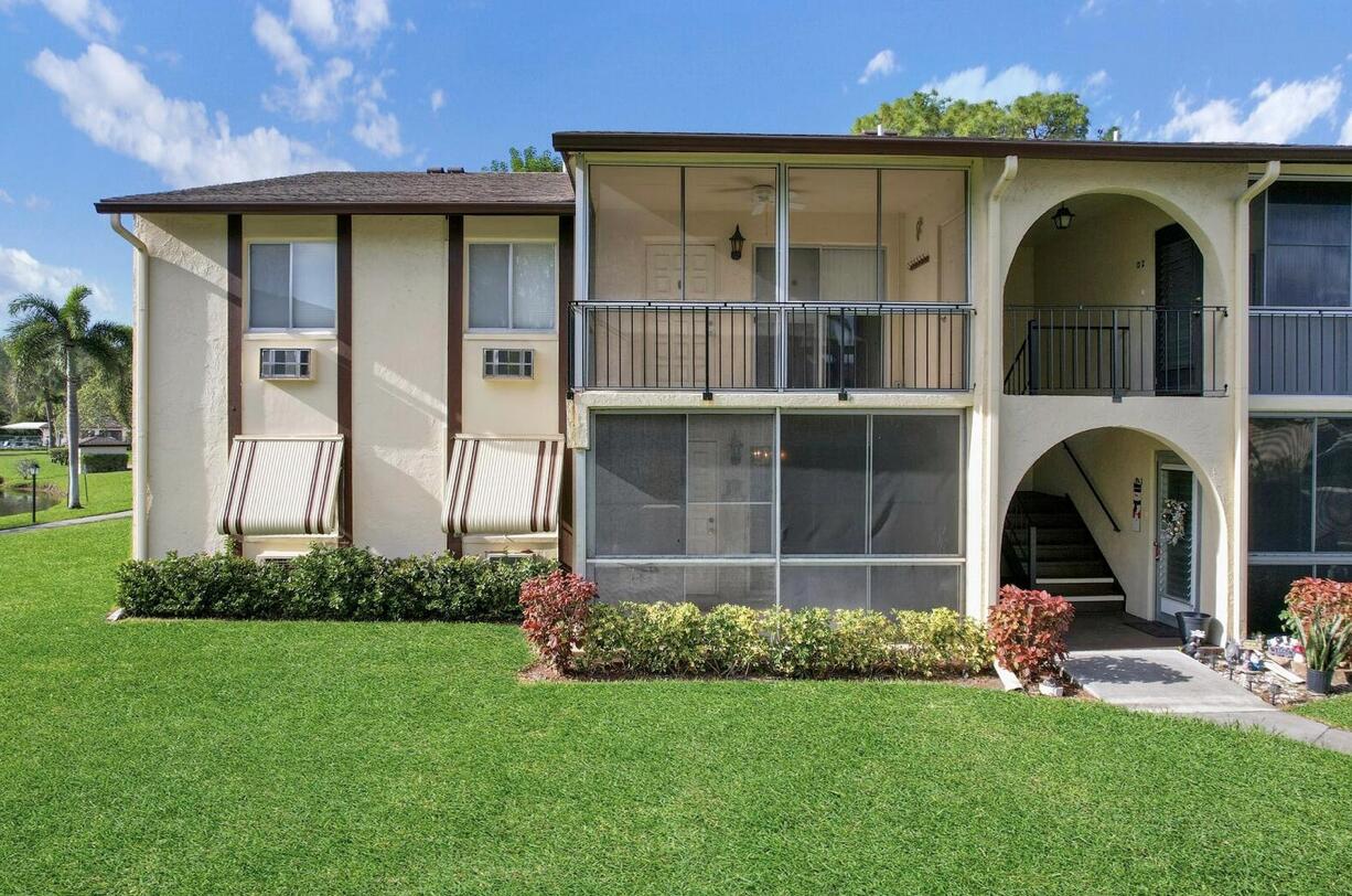First Floor 1 bedroom 1 bath Condo located in the quaint community of La Piñata.  Lake View from bedroom and front porch this spacious corner unit has an open floorplan and includes: interior laundry room with full size Washer & Dryer, walk-in Pantry/Storage, fresh Paint in living area, Screened Porch, Walking Paths and much more. This friendly 55+ community is centrally located near shops, medical, Turnpike and I-95.