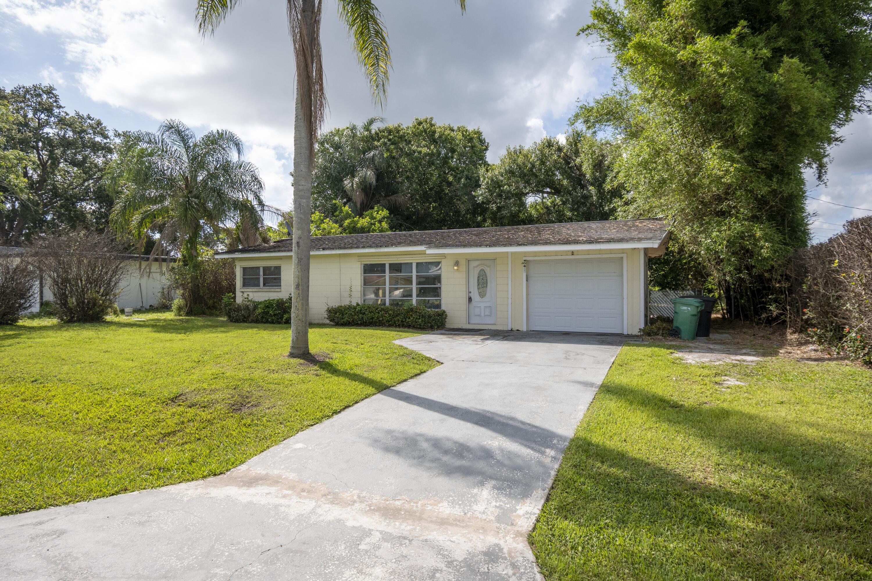 2 bedroom, 1 bathroom CBS home with garage and huge fenced yard in central Port St Lucie location (River Park). A long- term tenant just moved out. The property needs some TLC to be rent ready or to move in. A new kitchen was installed 4 years ago with quartz counter tops, cabinets and backsplash. Central air not blowing cold probably needs servicing. NO FHA.
