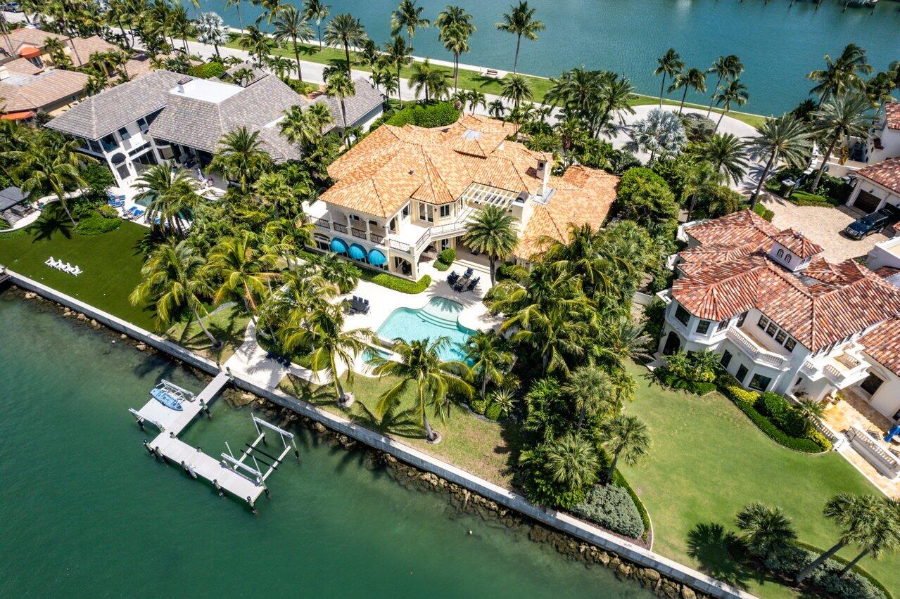 Magnificent Mediterranean estate home situated on half an acre of direct waterfront property. Endless views of wide water on the Indian River. Almost 13,000 sf of house comprises 4 bedrooms downstairs & an entire upstairs master suite. Wonderful outdoor entertainment spaces set around an infinity pool & spa. Dock with lift. 
Sailfish Point's unique location directly on the Atlantic Ocean and St. Lucie Inlet at the Southern tip of Hutchinson Island, makes it a community like no other. 

Residents enjoy 5 miles of pristine shoreline, oceanfront Jack Nicklaus ''Signature'' golf, elegant beachfront country club & full-service marina w immediate ocean access. Resort-style amenities include state-of-the-art fitness complex, spa/salon, Har-Tru tennis courts & the ultimate in private security.