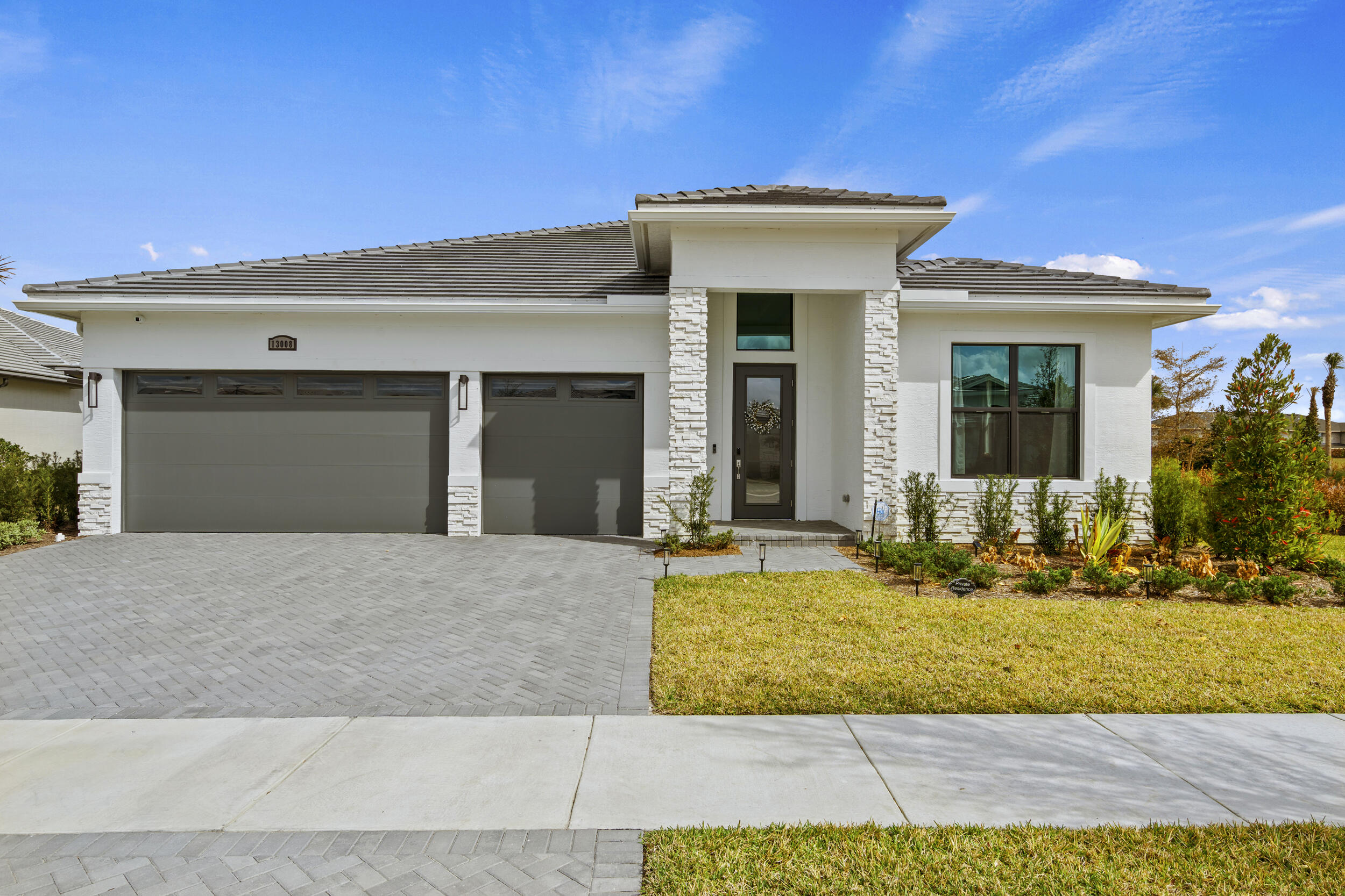 Located in Astor Creek Golf & Country Club, the newest golf community in Port St. Lucie.  This newly built 2025 Kolter home offers over 2,500 square feet of living space on a private premium lot and features over $280,000 in upgrades, including upgraded kitchen appliances, designer lighting, an outdoor kitchen, water treatment system, automated shades, an extended patio, an expanded primary bathroom, a screened-in lanai, a wine refrigerator, large lot room for a pool and many additional custom enhancements throughout -- why wait to build when you can move in now! Come see it! There is plenty of room for an amazing pool.  Ask about the available pool plans and pricing.  The $50,000 golf membership initiation fee is being paid by the sellers at closing.  Golf cart & furniture is negotiable. Astor Creek Country Club -- Elevated Golf & Resort-Style Living
This isn't just a home -- it's a lifestyle address. Astor Creek is a gated, championship golf community anchored by a Chris Wilczynski-designed 18-hole course with driving range, short-game complex and practice putting greens.

As an owner here, you enjoy a resident golf membership included with your home -- full access to the course, clubhouse, practice facilities and social amenities.

Community perks extend well beyond golf, including:
" Resort-style pool & sundeck with cabanas
" Lighted pickleball courts and tennis courts
" Bocce and basketball courts
" State-of-the-art fitness center
" Full-service clubhouse with dining, social spaces and bar
" Active lifestyle calendar and resident programming
" Miles of scenic walking trails woven through the neighborhood

Astor Creek is positioned for premier Treasure Coast access -- minutes from I-95 and the Turnpike, bringing beaches, shopping, dining and all the Port St. Lucie lifestyle within reach.

Bottom Line:
You're not buying just another house -- you're securing an upgraded, move-in ready home in one of South Florida's most complete golf and lifestyle communities. From luxury interior details to a private lot with pool potential and membership-level country club living, this is rare serious value in Port St. Lucie.

Call today. Don't let this one sit.