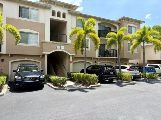 PER HOA - ALL UNMARRIED APPLICANTS  MUST HAVE 650 MINIMUM CREDIT SCORE.  MARRIED COUPLES ONLY ONE HAS TO HAVE 650 CREDIT SCORE. This is the one to see!! 3 bedrooms with 2 full baths with a 1 car garage. Updated kitchen with stainless steel appliances, undermount sink, newer cabinets, granite counter tops, decorative backsplash, & huge pantry. Additional features include wood laminate flooring in the main areas, brand new laminate flooring in the bedrooms, updated bathrooms, new remote ceiling fans throughout, and the unit is freshly painted. Enjoy the beautiful lake views. If you like to swim you are only only steps to the pool. Other features include master bedroom has 2 closets, unit has hurricane panels too. Water included in rent. Sorry no pets!!!  Washer and Dryer As-IS.