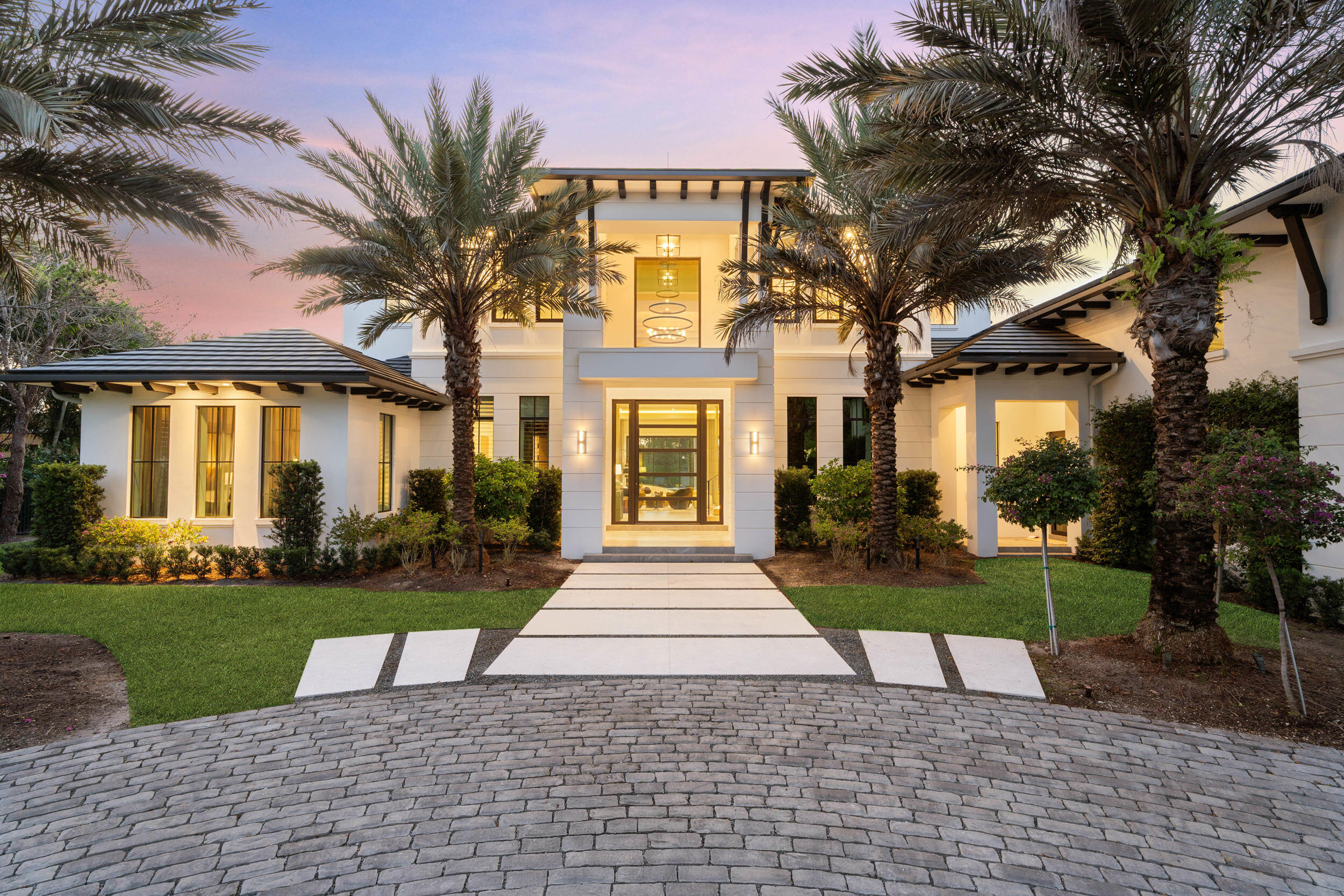 Welcome to an extraordinary opportunity to own a masterpiece of architectural design & refined living in one of Florida's most exclusive private communitiesThe Bear's Club. This custom-built 2024 estate, conceived by renowned luxury designer Marc-Michaels, represents the pinnacle of craftsmanship, sophistication, and resort-style living.This residence was created for the discerning buyer who demands exceptional quality, privacy, & timeless elegance. CBS constructed with full home generator, impact windows & doors. The kitchen encompasses a double marble waterfall islands, Wolf appliances, walk in pantry & an elongated bar, ice maker & wine fridge with the ambiance of a gas fireplace. The outdoor resort living offers summer kitchen, ceiling drop down TV, electric screens & luxury salt wa