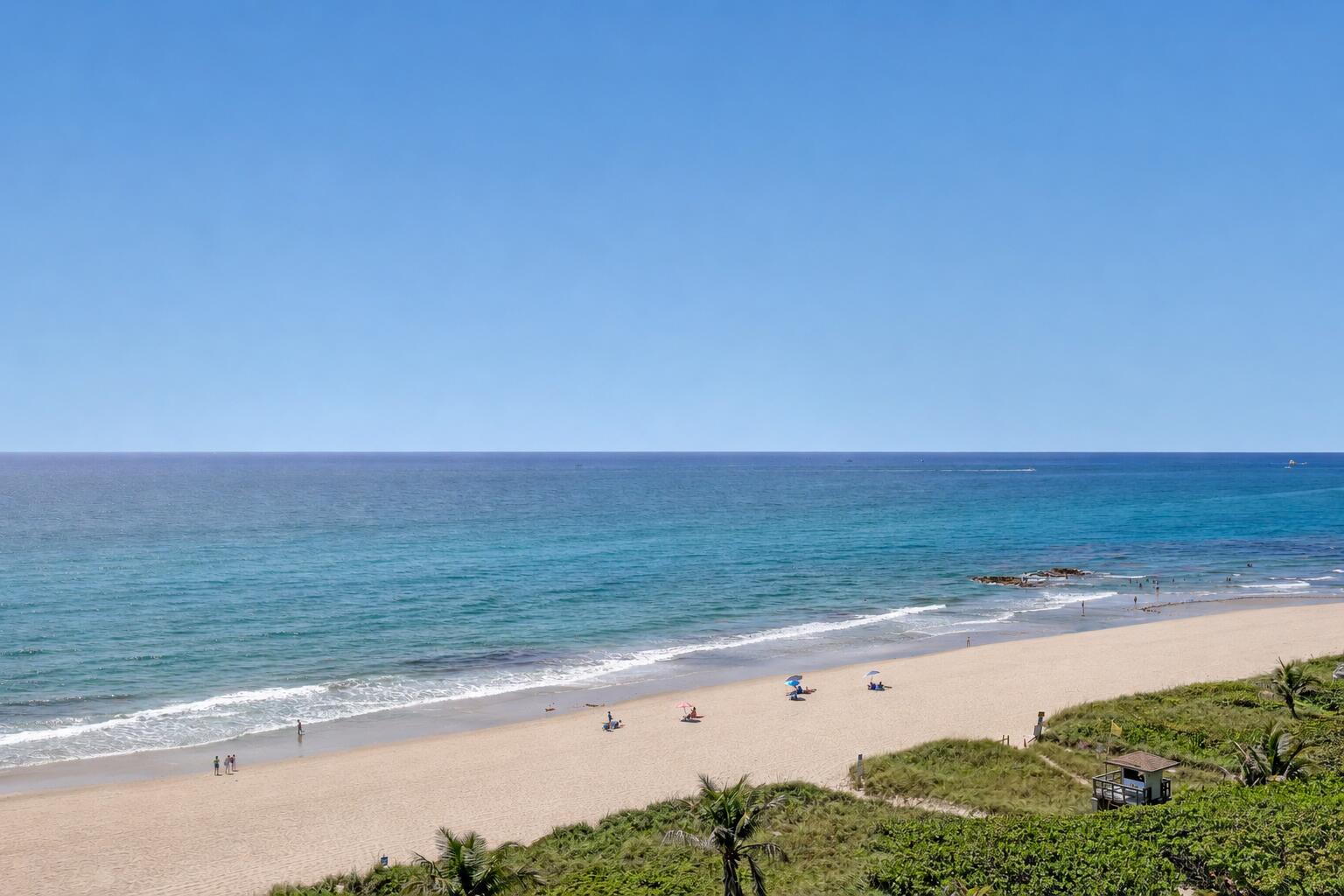 Wake up to sweeping Atlantic Ocean views from this stunning 9th-floor residence at Oasis-one of Singer Island's most exclusive boutique buildings with only 38 residences. Arrive through your private elevator entrance, where floor to ceiling windows and direct ocean views set the tone the moment you step inside. Spanning approximately 4,200 square feet and completely renovated, this one-residence-per-floor layout blends refined  coastal elegance with every modern appointment. Three private balconies capture the full beauty of the surroundings-ocean to the east, intracoastal to the west, sweeping coastal panoramas in every direction- ensuring sunrise, sunsets and everything in between are always within reach. The gourmet kitchen flows seamlessly into expansive living and dining room. Primary suites offers direct ocean views, generous closet space, and a spa-inspired bath. Minutes from Palm Beach, world-class dining, golf, and Palm Beach International Airport, Unit 9b delivers privacy, accessibility, and lifestyle in one  remarkable coastal retreat.