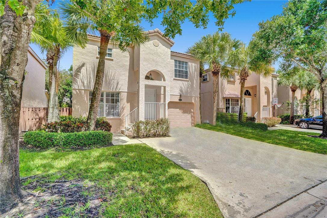 BIG PRICE REDUCTION! Located in the ritzy & sought after area of Plantation FL in the Minto Complex, is this rarely available home. It is quietly tucked away in this exclusive community, boasting 3 bedrooms and 2 full bathrooms with a powder room on the main level. The kitchen is suited with all stainless steel appliances and a bar style counter top. Just off the kitchen is a screened in back patio that seamlessly connects the inside to the exterior of the home, making this layout excellent for entertaining family and friends. This community offers a community pool, a clubhouse, and Deicke Park.