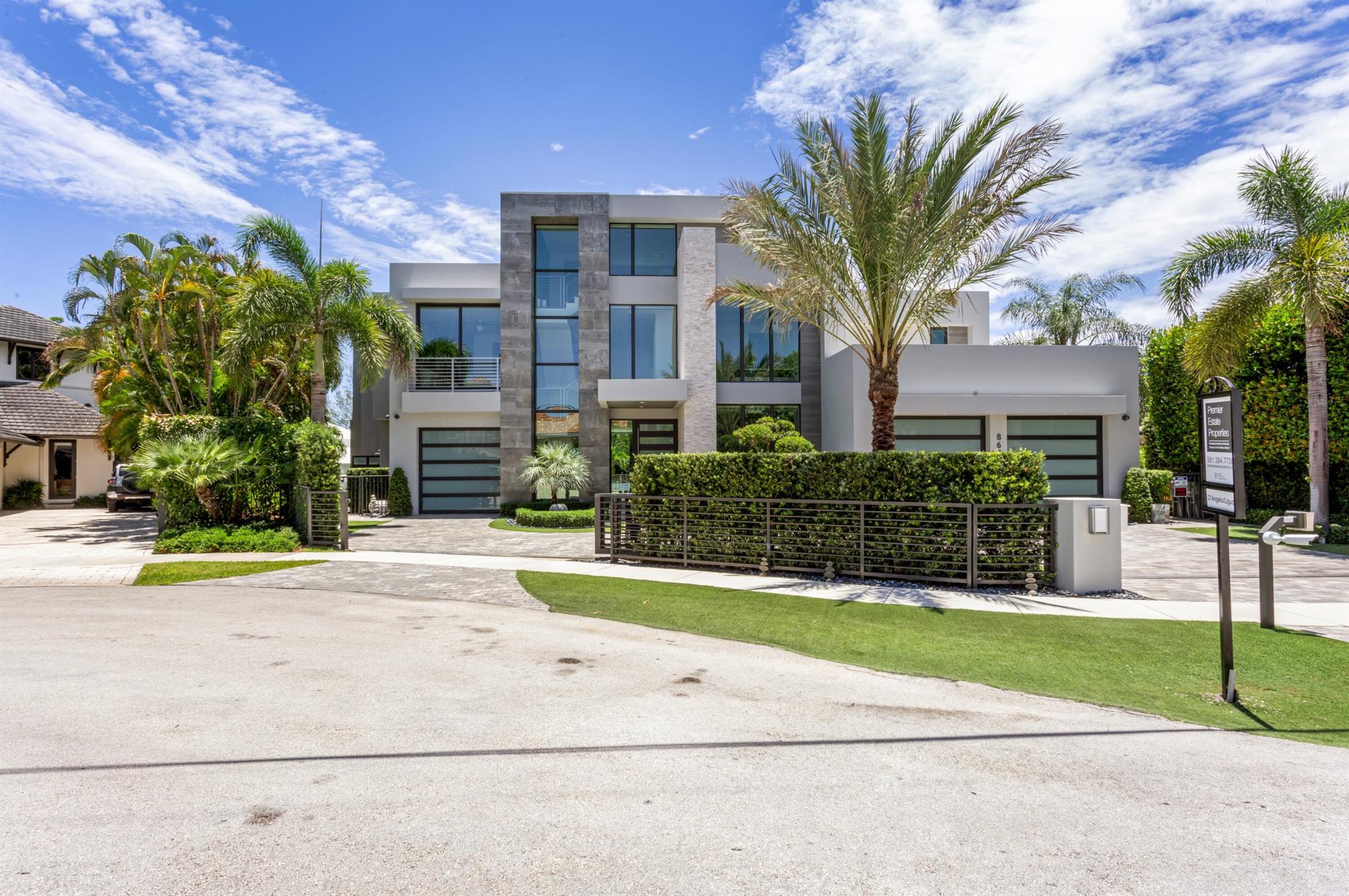 Sleek Modern 3-level Lake Rogers Isles deepwater estate sited on 125 +/- feet of waterfrontage, one off the point with rare Spanish River Park wooded views and originally built by JSB Builders. Light- filled estate with dramatic glass and steel floating staircase highlight with a soaring signature wall up the third floor opens to the great room with fireplace and window walls of glass overlooking the pool and waterway beyond. Gourmet kitchen island kitchen boasts suede finish stone countertops and glass subway tile backsplash, top of line appliance package and walk-in pantry. The dining room features a 1000 bottle glass wine vault to a professional bar. A Family room and adjacent Bedroom suite #5/Office completes this level. The second level provides a waterfront Primary Suite with dual baths and 3 additional bedrooms suites plus a theater/media room that can accommodate family and guests. The third level includes a Club Room with powder bath and outdoor rooftop sky deck with plush turf deck with putting green and hot tub all over with panoramic views. Outdoor entertaining features a mosaic tiled pool with sun-shelf, lanai with drop down screening, electric awning, fully equipped yacht dock with major 50k lb. lift and separate wave runner lift. Other amenities include a gated motor court, elevator, 3 bay garage with lift for a 4th, and home generator. Shown by appt only.

DISCLAIMER: Information published or otherwise provided by the listing company and its representatives including but not limited to prices, measurements, square footages, lot sizes, calculations, statistics, and videos are deemed reliable but are not guaranteed and are subject to errors, omissions or changes without notice. All such information should be independently verified by any prospective purchaser or seller. Parties should perform their own due diligence to verify such information prior to a sale or listing. Listing company expressly disclaims any warranty or representation regarding such information. Prices published are either list price, sold price, and/or last asking price. The listing company participates in the Multiple Listing Service and IDX. The properties published as listed and sold are not necessarily exclusive to listing company and may be listed or have sold with other members of the Multiple Listing Service. Transactions where listing company represented both buyers and sellers are calculated as two sales. "No payments made until title passes" Some affiliations may not be applicable to certain geographic areas. If your property is currently listed with another broker, please disregard any solicitation for services. Information published or otherwise provided by seller, listing company or its representatives is deemed reliable but are not guaranteed and subject to errors, omissions, or changes without notice. Copyright 2025 by the listing company. All Rights Reserved.