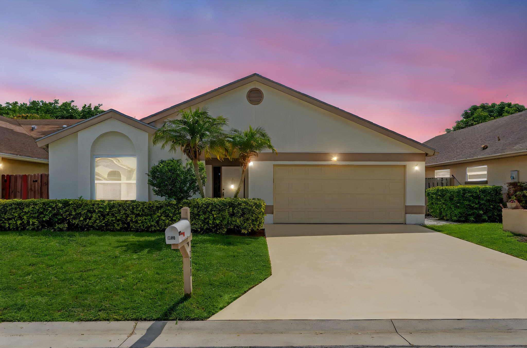 Welcome to paradise in the heart of Wellington! This beautifully updated waterfront home in the highly desirable Waterway Cove community offers the perfect combination of style, comfort, and location. From the moment you walk in, you'll notice the pride of ownership and attention to detail throughout.  Featuring 3 bedrooms, 2 bathrooms, and a spacious split floor plan, this move-in-ready home has been extensively upgraded with newer windows, updated flooring, renovated bathrooms, an updated kitchen, newer A/C, water heater, and more. The bright and open living spaces flow seamlessly to the screened patio overlooking peaceful canal views — the perfect place to relax or entertain.  The oversized 2-car garage offers endless possibilities and can easily function as a home gym, office, workshop, game room, or ultimate man cave.  Located just minutes from world-class equestrian venues, shopping, dining, parks, the Wellington Amphitheater, and top-rated schools, this home places you in the center of everything Wellington has to offer. Enjoy the convenience of a LOW HOA while living in one of Palm Beach County's most sought-after communities.  Whether you're looking for a primary residence, seasonal retreat, or investment opportunity, this property checks every box. Investor-friendly community with immediate rental potential available.  Homes this updated, this clean, and this well-located rarely become available under $500k in Palm Beach County! Call/text us today to setup your private tour!