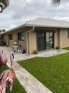 Cozy unit with great views of the canal. Located in the gorgeous city of Lighthouse Point community. Apartment is on the first floor and completely updated. Modern coastal style on the water. Great views of the water from your backyard. Property is a 1/1 with washer and dryer inside unit. This is a single-family house with mother ion law suite. The unit on the ride side of the home.