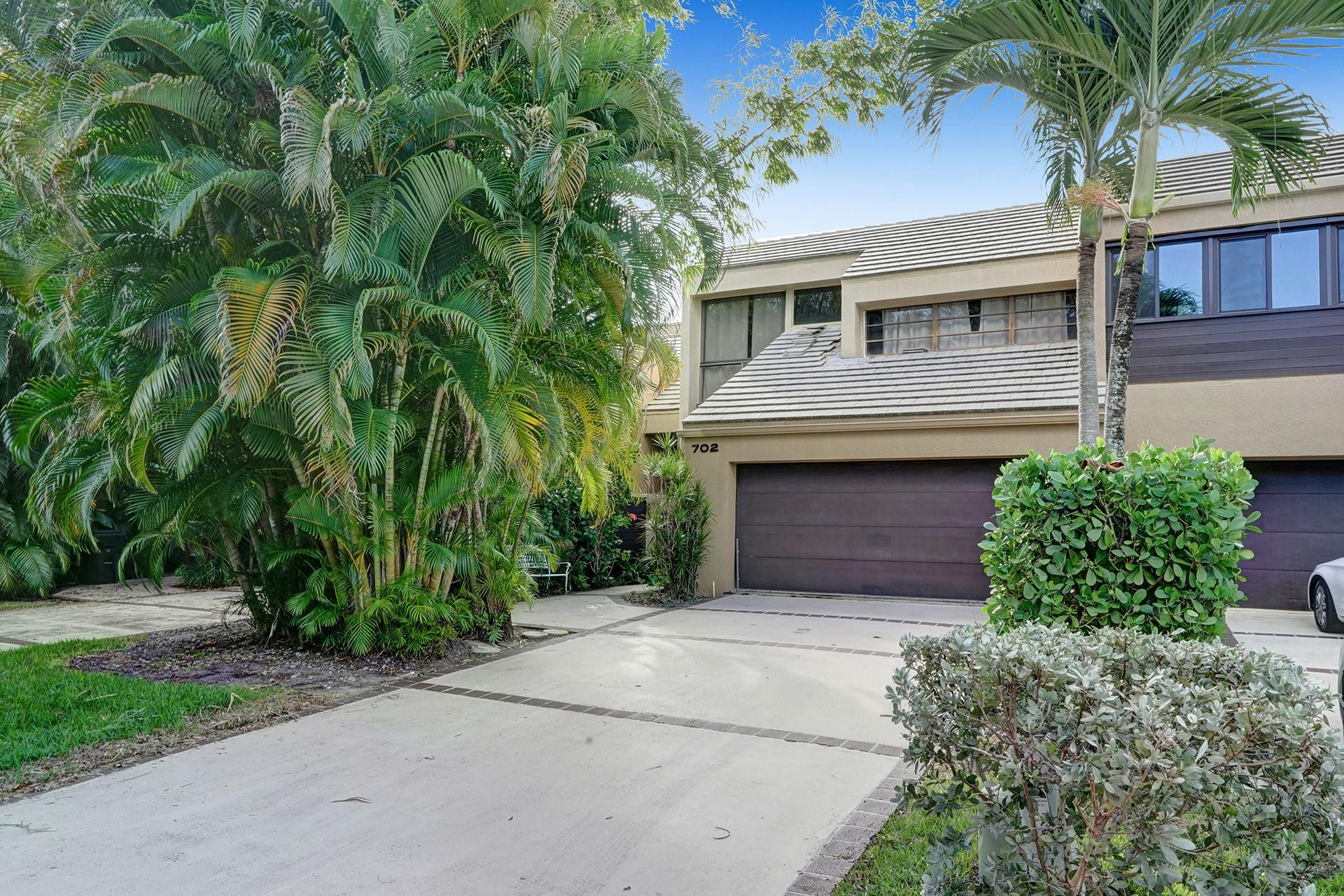 Fully furnished townhome available for Annual Lease or Seasonal. Fantastic East Boca location. 3 bedroom + Office/Den. Very light & bright. Kitchen features stainless steel appliances with a breakfast bar & dining room. Large living room space, vaulted ceilings in every room & sliding glass doors overlooking the tropical zen-like patio and private backyard. The master bedroom has a walk in closet, balcony, skylights and a large soaking tub in the bathroom. All bedrooms are upstairs, the office is downstairs. Washer and dryer room. Pet friendly! Quiet community with resort-style secluded pool, hot tub & sauna. Steps from the Boca Hospital, FAU, beaches & restaurants. A rated schools. Must see!! The garage has been converted to storage, and only half is available to the tenant.
