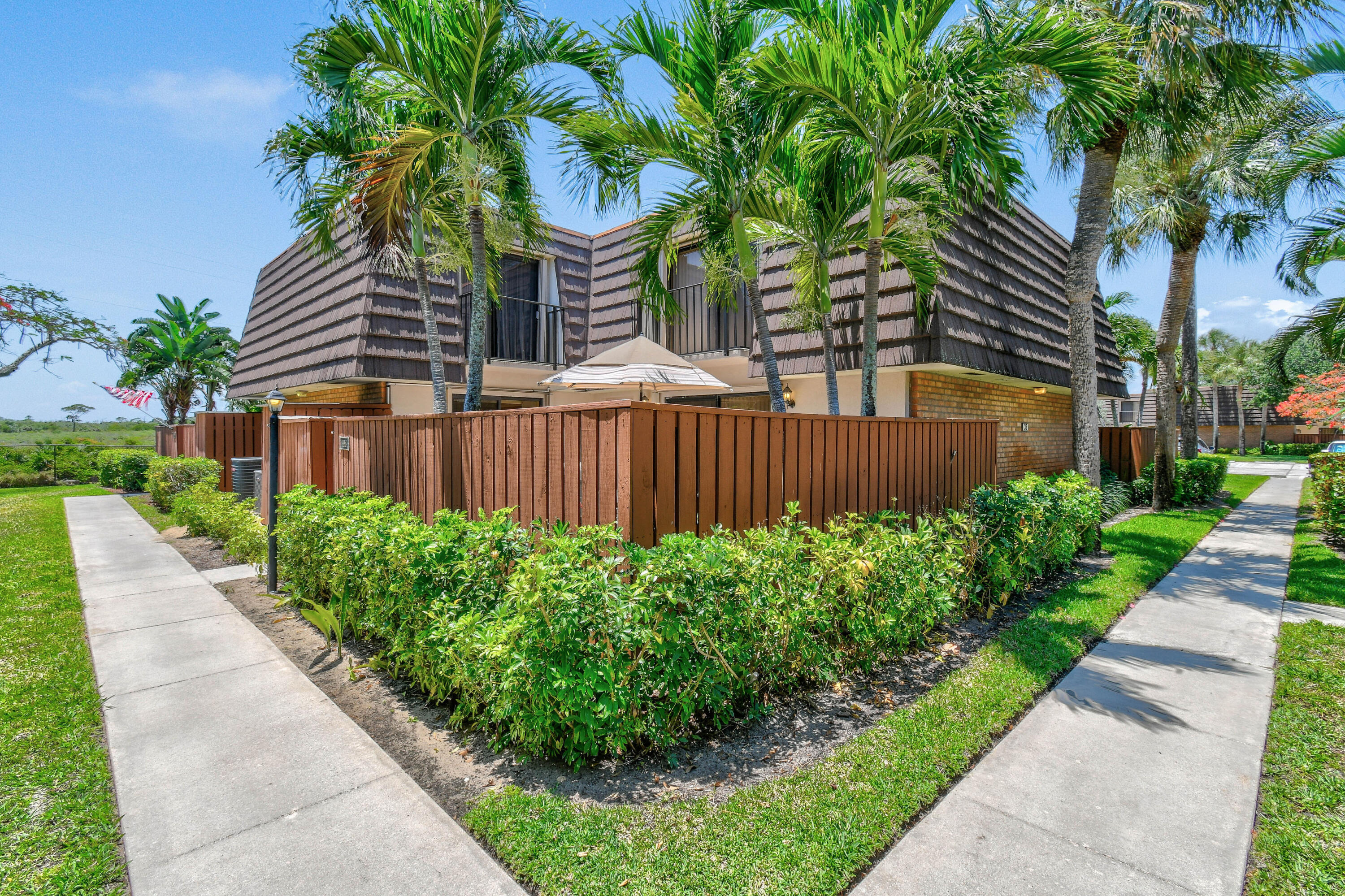 This fully furnished townhome is available now for annual rent. The property boasts a private location within the highly desirable Lakes at the Bluffs community. The courtyard is a great place to relax, BBQ and enjoy ocean breezes. Primary bedroom has a queen size bed and the guest bedroom has twin beds. Residents here enjoy access to a range of amenities, including a beautiful pool, tennis and pickleball courts. The location is also conveniently close to the beach, shopping, dining, golf courses, and much more. Additionally, Palm Beach International Airport is less than a 30-minute drive away.