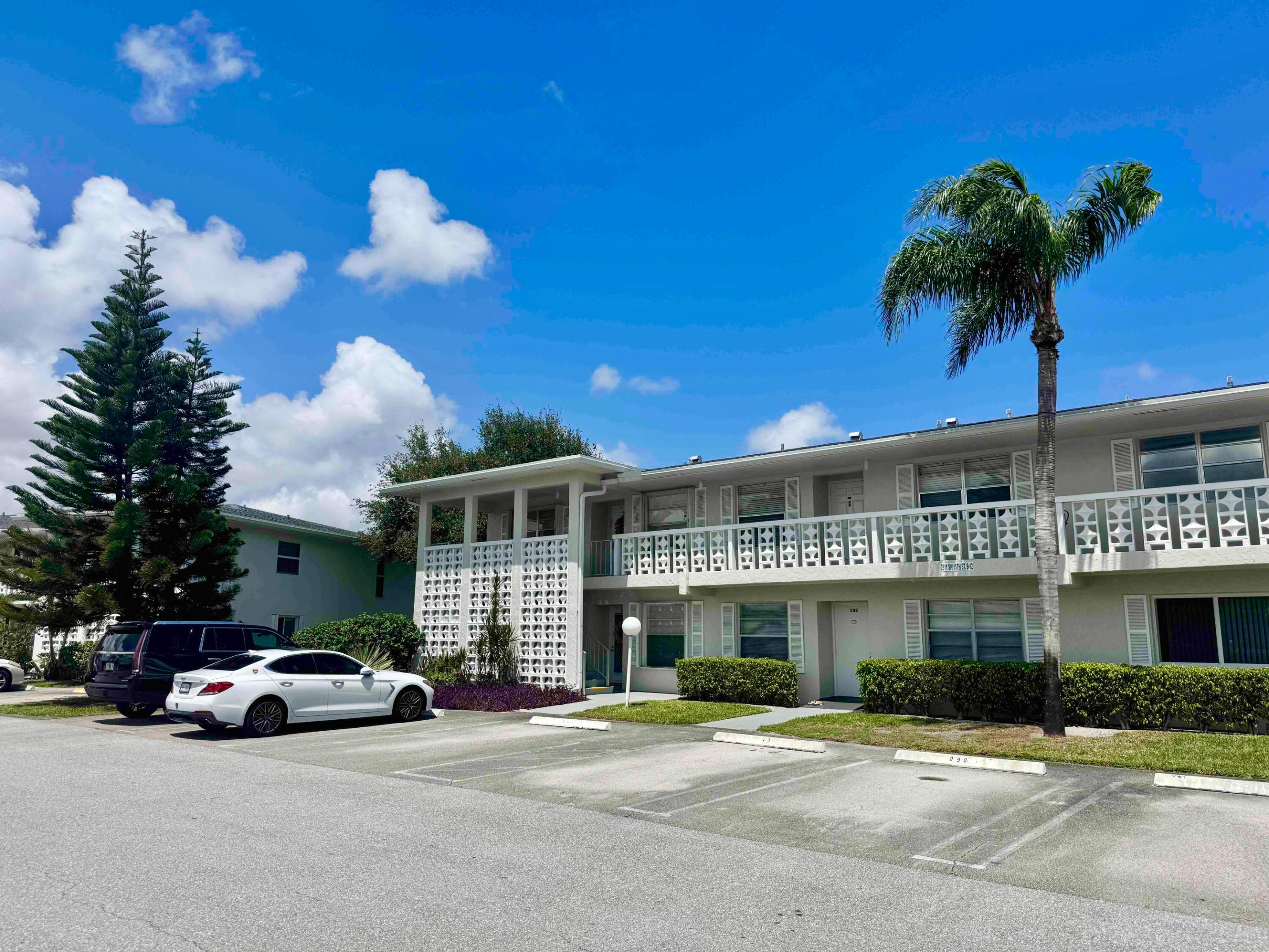 BEST LAKE VIEW IN COMMUNITY. LARGE ENCLOSED PATIO. Gorgeous condo, completely renovated in 2023 in desirable Delray Beach. NEW A/C installed in June 2025! Best Lake view in the community! Second floor 2 bedrooms - 2 full baths! 2 walk-in closets and linen closet in master bedroom.. NEW 2023 roof on the building. Both bedrooms have Fans! Easy to maintain Tile floors though out the entire home! NEW baseboards! - Upgraded Kitchen and bathroom cabinets * Granite counter tops * Mosaic backslash * Stainless steel double sink * New Faucets * Stainless Steel appliances... Front load washer and dryer *** The kitchen is open to the living rom *** Super clean and move-in ready! Discover waterfront living in this charming 2-bedroom, 2-bathroom condominium located in the Pines of Delray in Delray Beach