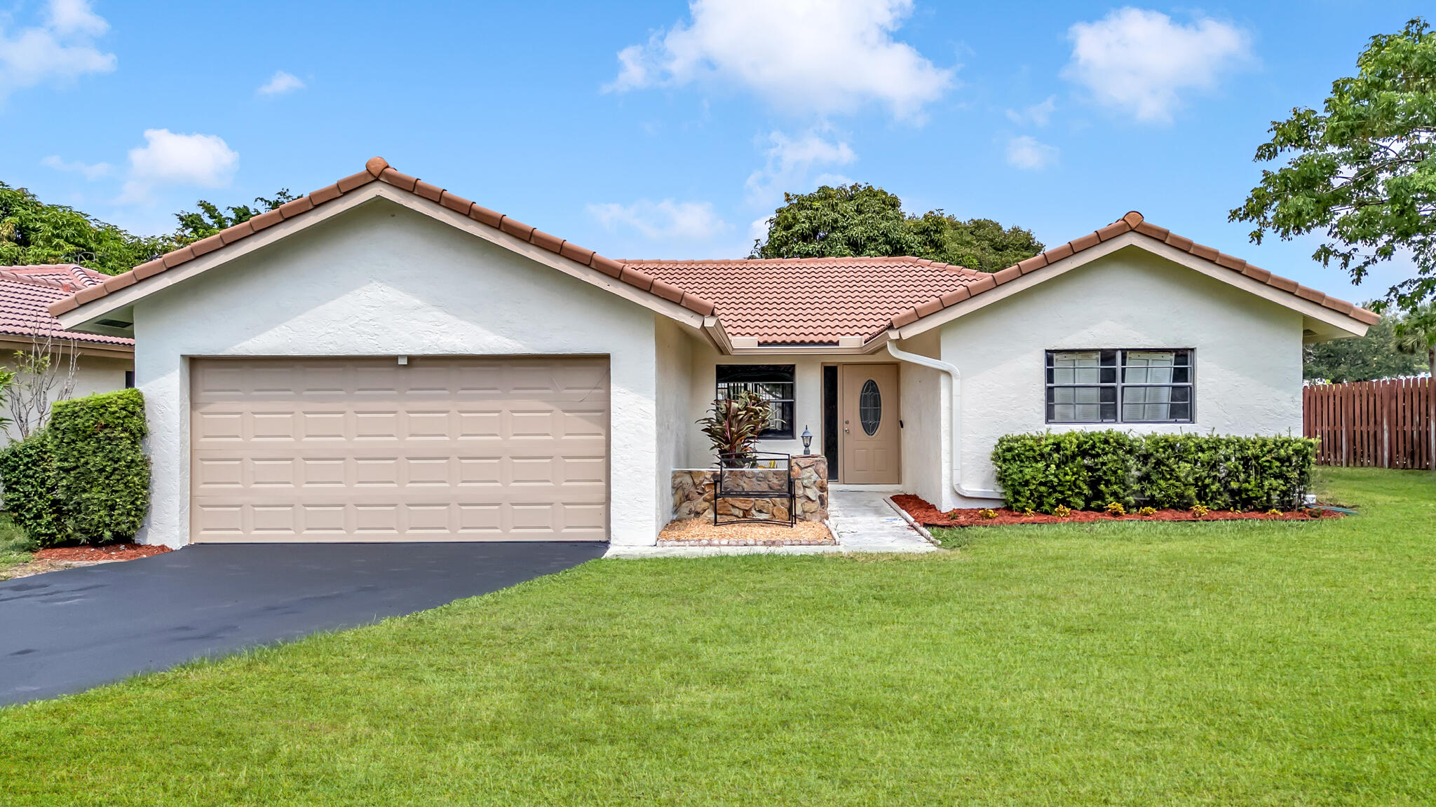 Welcome to this charming single-story residence in Spring Circle Villas, located in Coral Springs. This 1,451 square foot home features three generous bedrooms and two full bathrooms, providing comfortable accommodations for various living arrangements. The property includes a two-car garage, offering convenient parking and storage solutions. As a waterfront property, this home presents a unique opportunity to enjoy the tranquility of water views. This single-family residence combines practical design with waterfront appeal, making it an excellent choice for those seeking a well-proportioned home in an established community.  The community offers a. community pool and tennis court.  Maintenance is only $95/month This is the Best Buy in Coral Springs.The elementary and middle school are within walking distance.
