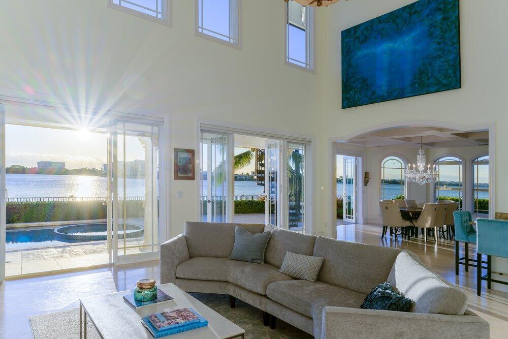 Experience direct Intracoastal living & unprecedented privacy featuring 325' of waterfront & 200' of dock 15 min to downtown, Worth Ave & PBI Offering both a primary & secondary residence with a combined 8300+ SF and preferred Southeast waterfront exposure . The primary residence is host to a 17' backlit quartzite island, water's edge dining & living areas, a 5-room owners suite with panoramic vista's and an ocean-facing rooftop terrace! Reimagined, the secondary residence offers its own waterfront living experience. The estate boasts waterside kitchens & great rooms surpassed only by the 300' of coastal loggia's and an elevated dock connecting the dwellings. The primary residence also available separately: See RX-11053228. Seller offering tax incentives to qualified buyers.