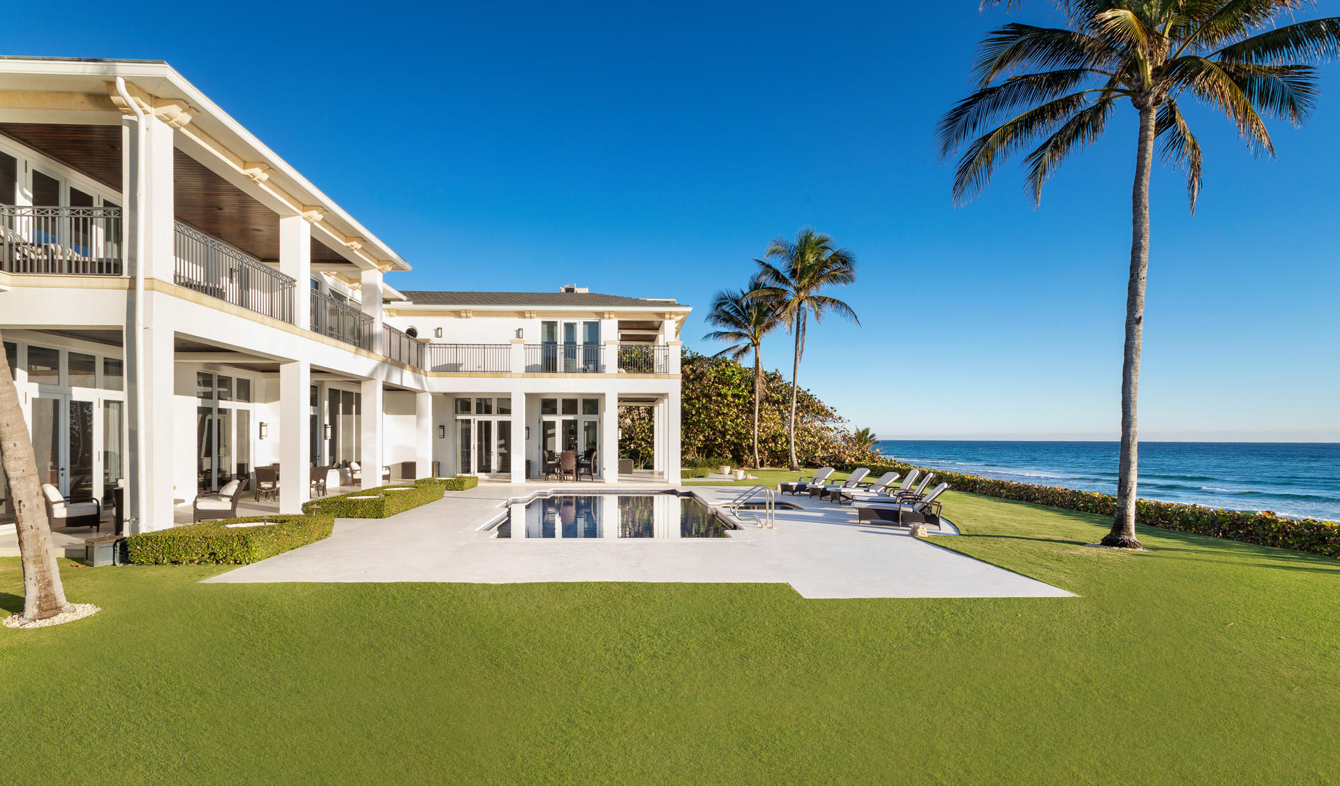 The Hamptons meets Hillsboro Beach..Sited on 1.06+/-  acres, this reimagined Gated Coastal-inspired Ocean-to-Intracoastal Estate sited on 1.5 lots with 161 +/- feet of beach frontage and 'no wake' Intracoastal frontage on prestigious Hillsboro Mile. Exquisitely finished with bleached wood floors, extensive millwork and a chic coastal palette of casual and comfortable hues throughout. Resort-like pool/patio with flexible 'all season' indoor/outdoor lanai and verdant lawn for entertaining. Fully equipped Mega-Yacht dockage minutes to the Hillsboro Inlet. DISCLAIMER: Information published or otherwise provided by the listing company and its representatives including but not limited to prices, measurements, square footages, lot sizes, calculations and statistics are deemed reliable but are not guaranteed and are subject to errors, omissions or changes without notice. All such information should be independently verified by any prospective purchaser or seller. Parties should perform their own due diligence to verify such information prior to a sale or listing. Listing company expressly disclaims any warranty or representation regarding such information. Prices published are either list price, sold price, and/or last asking price. The listing company participates in the Multiple Listing Service and IDX. The properties published as listed and sold are not necessarily exclusive to listing company and may be listed or have sold with other members of the Multiple Listing Service. Transactions where listing company represented both buyers and sellers are calculated as two sales. The listing company's marketplace is all of the following: Vero Beach, Town of Orchid, Indian River Shores, Town of Palm Beach, West Palm Beach, Manalapan Beach, Point Manalapan, Hypoluxo Island, Ocean Ridge, Gulf Stream, Delray Beach, Highland Beach, Boca Raton, East Deerfield Beach, Hillsboro Beach, Hillsboro Shores, East Pompano Beach, Lighthouse Point, Sea Ranch Lakes and Fort Lauderdale. Cooperating brokers are advised that in the event of a Buyer default, no commission will be paid to a cooperating Broker on the Deposits retained by the Seller. No commissions are paid to any cooperating broker until title passes or upon actual commencement of a lease. Some affiliations may not be applicable to certain geographic areas. If your property is currently listed with another broker, please disregard any solicitation for services. Copyright 2021 listing company All Rights Reserved.Vero Beach, Town of Orchid, Indian River Shores, Town of Palm Beach, West Palm Beach, Manalapan Beach, Point Manalapan, Hypoluxo Island, Ocean Ridge, Gulf Stream, Delray Beach, Highland Beach, Boca Raton, East Deerfield Beach, Hillsboro Beach, Hillsboro Shores, East Pompano Beach, Lighthouse Point, Sea Ranch Lakes and Fort Lauderdale. Cooperating brokers are advised that in the event of a Buyer default, no commission will be paid to a cooperating Broker on the Deposits retained by the Seller. No commissions are paid to any cooperating broker until title passes or upon actual commencement of a lease. Some affiliations may not be applicable to certain geographic areas. If your property is currently listed with another broker, please disregard any solicitation for services. Copyright 2021 by the listing company. All Rights Reserved.