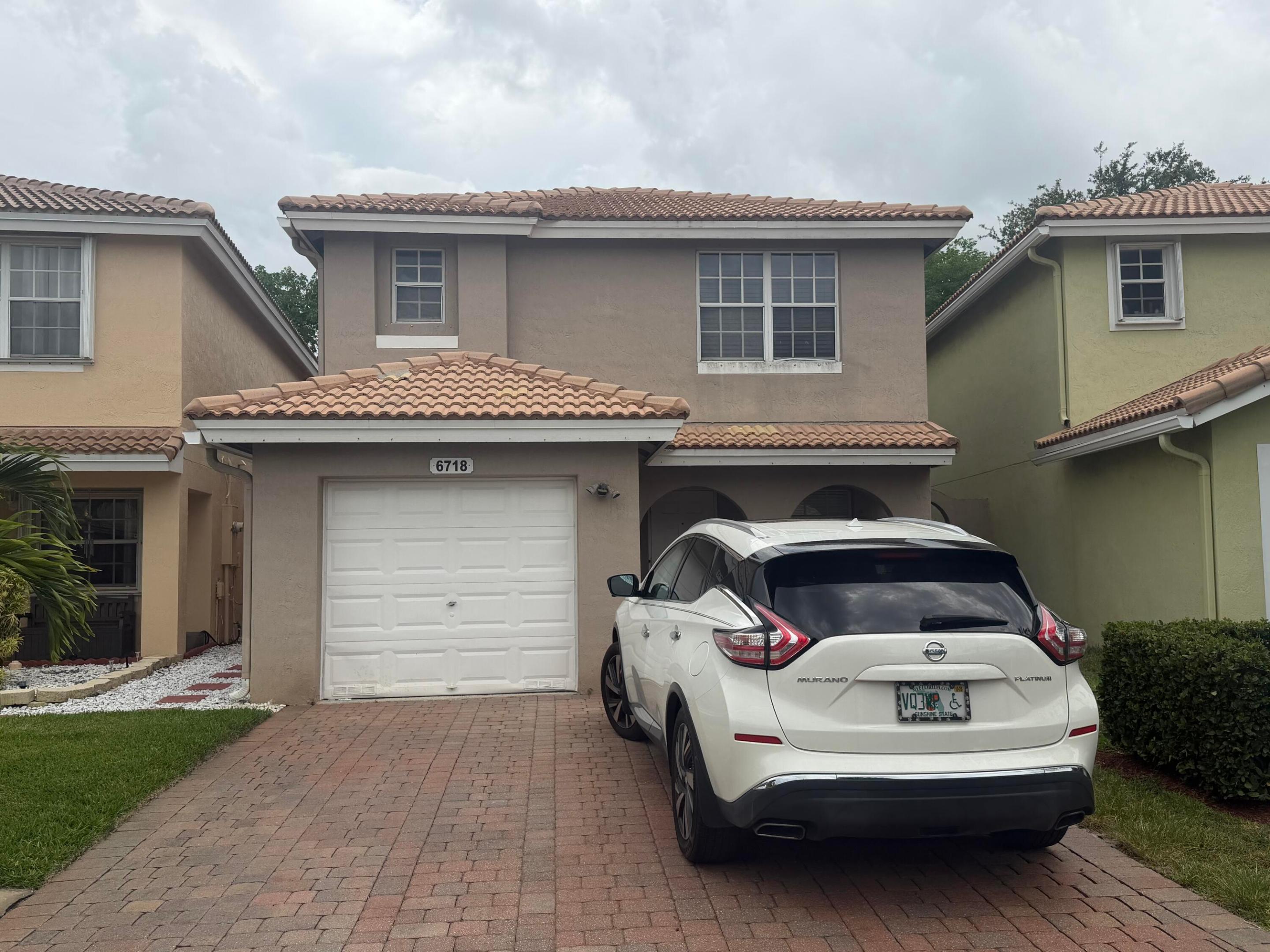 Welcome to this inviting waterfront home in the desirable Liberty Bay community of Royal Palm Beach. This two-story residence offers 3 bedrooms, 2.5 bathrooms, and 1,671 square feet of comfortable living space with peaceful water views and a serene backyard setting. Enjoy the beauty of waterfront living while being conveniently located near shopping, dining, parks, schools, and major roadways. The home features a permitted A/C installed in 2018, a one-car garage, and a functional layout ideal for everyday living. An excellent opportunity for buyers looking to personalize a well-located waterfront property and make it their own. Don't miss your chance to enjoy the Liberty Bay lifestyle at an exceptional value.