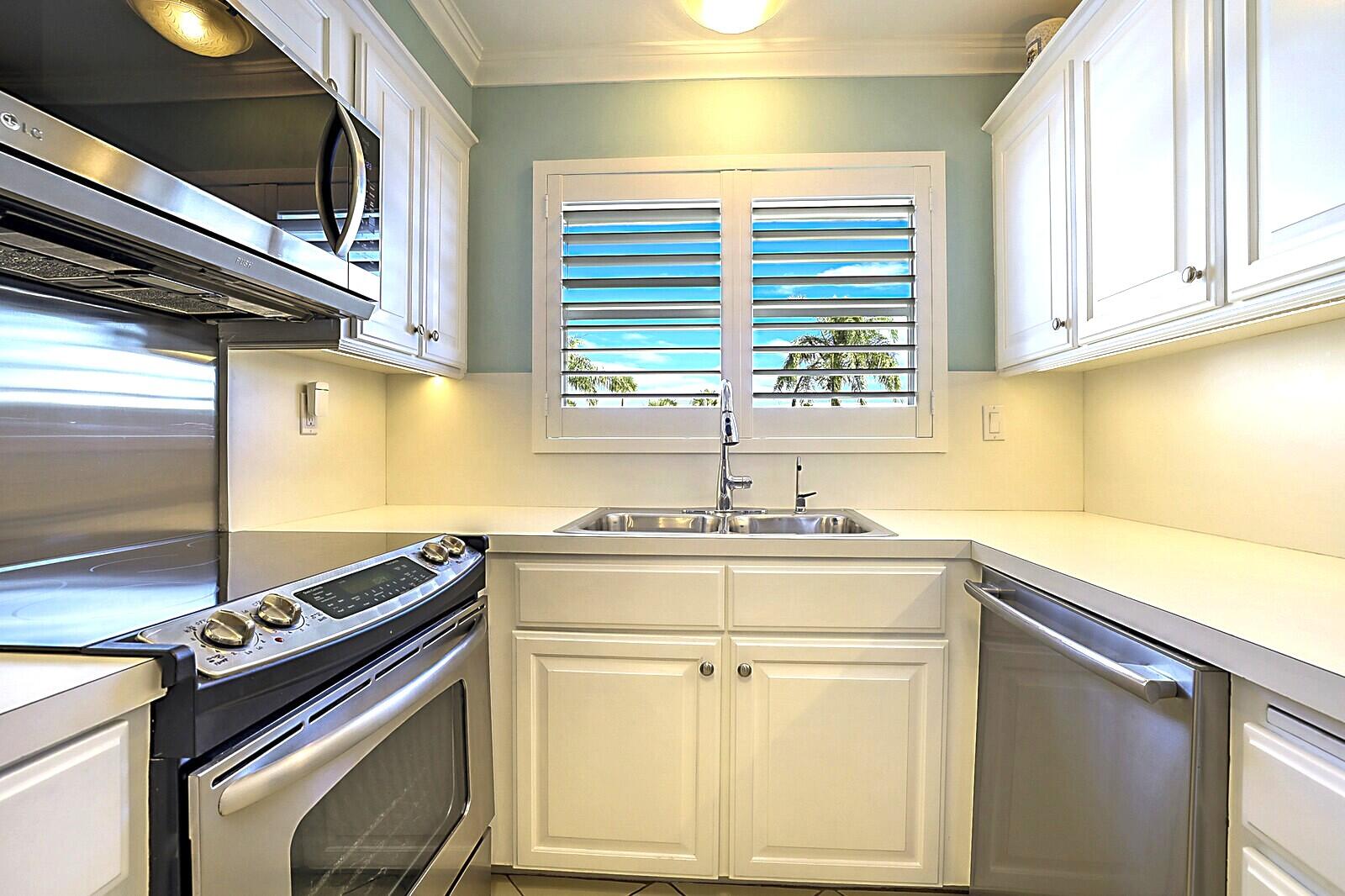 Price Reduced!! OPEN SUN 6/14 FROM 12-2:30PM!! Beautifully Maintained 2BR/2BA unit boasts Intracoastal and preserve views. Enjoy an open-concept kitchen with modern appliances, crown molding, plantation shutters, hardwood floors, and tile in kitchen/baths. The glass-enclosed patio doubles as a den or office with breathtaking water views. Elevator bldg. Resort-style amenities include a waterfront pool, common dock, and recreation room. ESA pets welcome and pets under 30lbs. HOA covers water and more. Located next to John Rutherford Park, less than 2 miles to Mizner Park, approx. 2.5 miles to FAU and 4 miles to Lynn U. Also, 7 miles to Delray's Atlantic Ave, and beaches--your slice of paradise awaits!! Condo offered with a 1yr appliance home warranty!! Furniture Negotiable