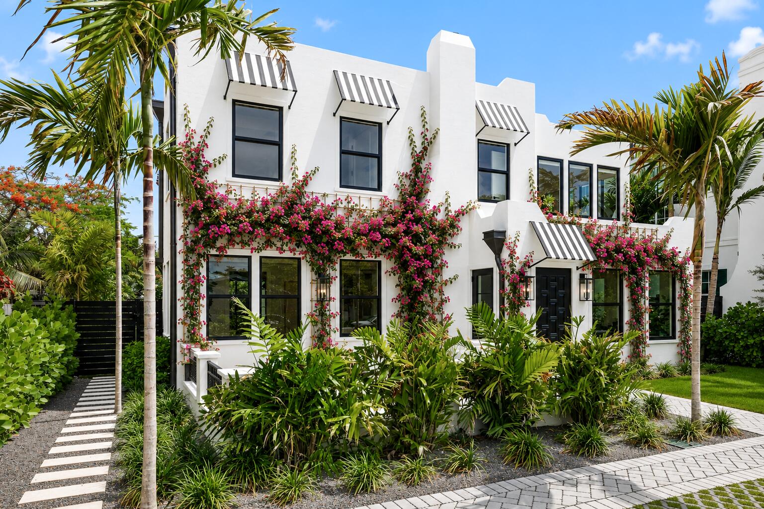 BRAND NEW CONSTRUCTION is now complete! This beautiful Southland Park residence offers 3,689 living SF and 3,942 total SF with 4 bedrooms, an office (or optional 5th bedroom), and 4.5 baths. Designed for both everyday living and entertaining, the home features wide-plank white oak floors, custom cypress details throughout, a marble wood-burning fireplace, motorized shades throughout, oversized custom closets, a beautifully designed kitchen with a butler's pantry, and the driveway is pre-wired for optional gate installation. A full-house generator provides an added layer of convenience and peace of mind. The outdoor living space is equally impressive, featuring a heated saltwater pool and spa, multiple terraces, and a summer kitchen finished with book-matched pecky cypress. The home also includes 150 SF of air-conditioned outdoor storage, ideal for bikes, kayaks, holiday decorations, and more. Cooling silica sand beneath the turf helps keep outdoor areas comfortable year-round, while lush tropical landscaping and mature trees surround the property, creating a serene and exceptionally private oasis. Developed by Gus Renny, built by Steve Cury Construction, and designed by SMR Consulting, this exceptional home also benefits from a rare 10-year tax exemption offering approximately $40,000 in annual savings. Ideally located on one of Southland Park's most desirable streets, just minutes from Palm Beach Island, Worth Avenue, Royal Poinciana Plaza, area beaches, top restaurants, shopping, Palm Beach International Airport, and private aviation facilities.