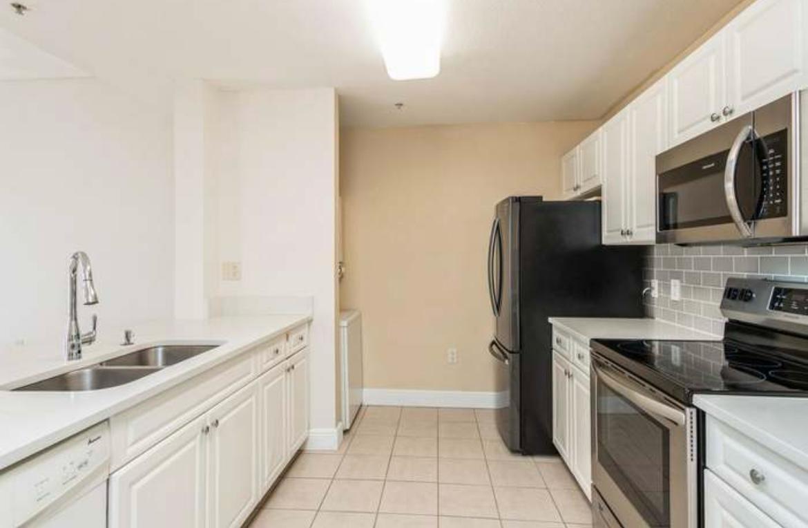 Location, Location Location!!! This beautifully renovated unit in the heart of Abacoa features wood floors throughout, a modern kitchen with quartz countertops, stainless steel appliances, and an in-unit washer and dryer. Enjoy French doors, impact windows, a private balcony, and brand new central air. 719 sq ft of bright, comfortable living space. Rent includes high-speed fiber internet, cable, water, sewer, and building insurance, plus access to a clubhouse, fitness center, pool, spa, and assigned covered parking. Steps from Downtown Abacoa's restaurants, shops, cafés, and events. Walking distance to FAU, Scripps, and Max Planck campuses. Roger Dean Stadium, Juno Beach, and Jupiter Medical Center are all just minutes away. Good credit and verifiable income required.