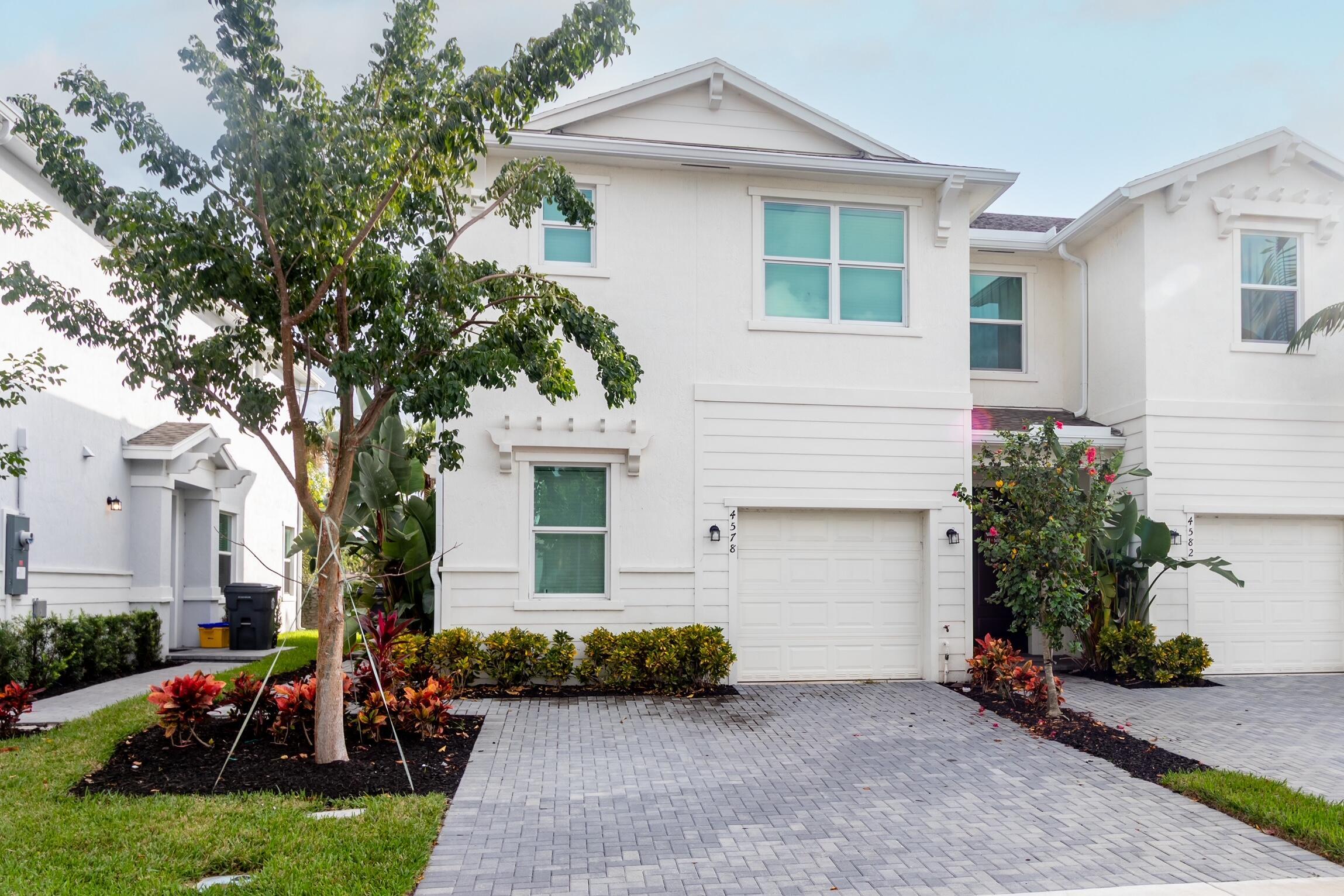 2 years old, Hurricane resistant windows. Corner unit with Larger S/F. Move in ready, Corean Countertops, stainless steel applainces. Close to 95 and all major attractions. Possible assitance with the closing cost to qualified buyers.