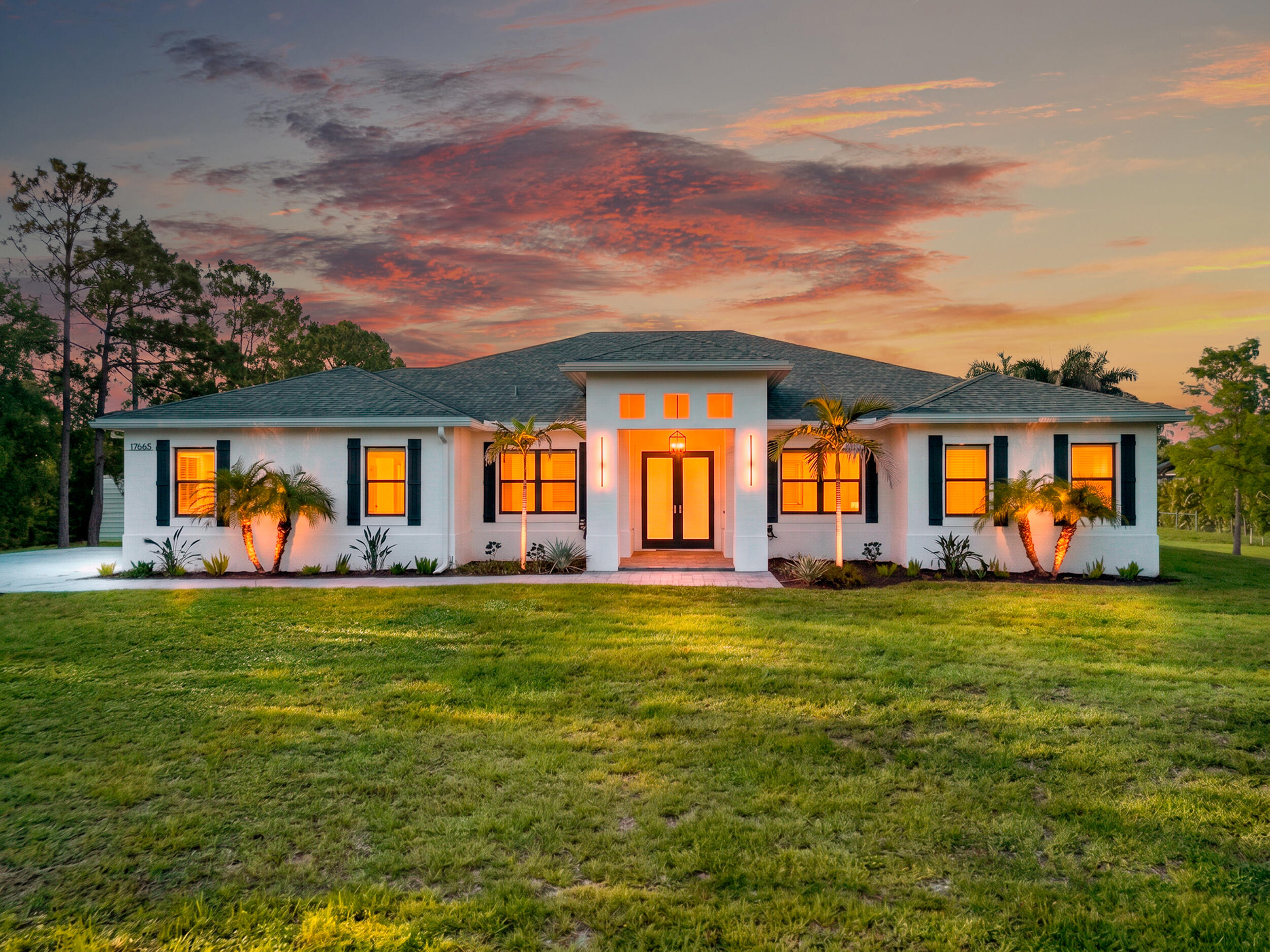 Welcome to this thoughtfully designed single-story residence in The Acreage, offering 2,946 square feet of comfortable living space. This four-bedroom, three-bathroom home provides ample room for various needs, whether you're seeking a spacious primary residence or a versatile layout for guests and entertaining. The three-car garage ensures convenient parking and storage solutions for vehicles and equipment. Situated on acreage in The Acreage community, this property delivers the benefits of a single-level floor plan without the complexity of multiple stories. This residence represents a solid opportunity for those seeking substantial square footage and practical amenities in a residential setting.