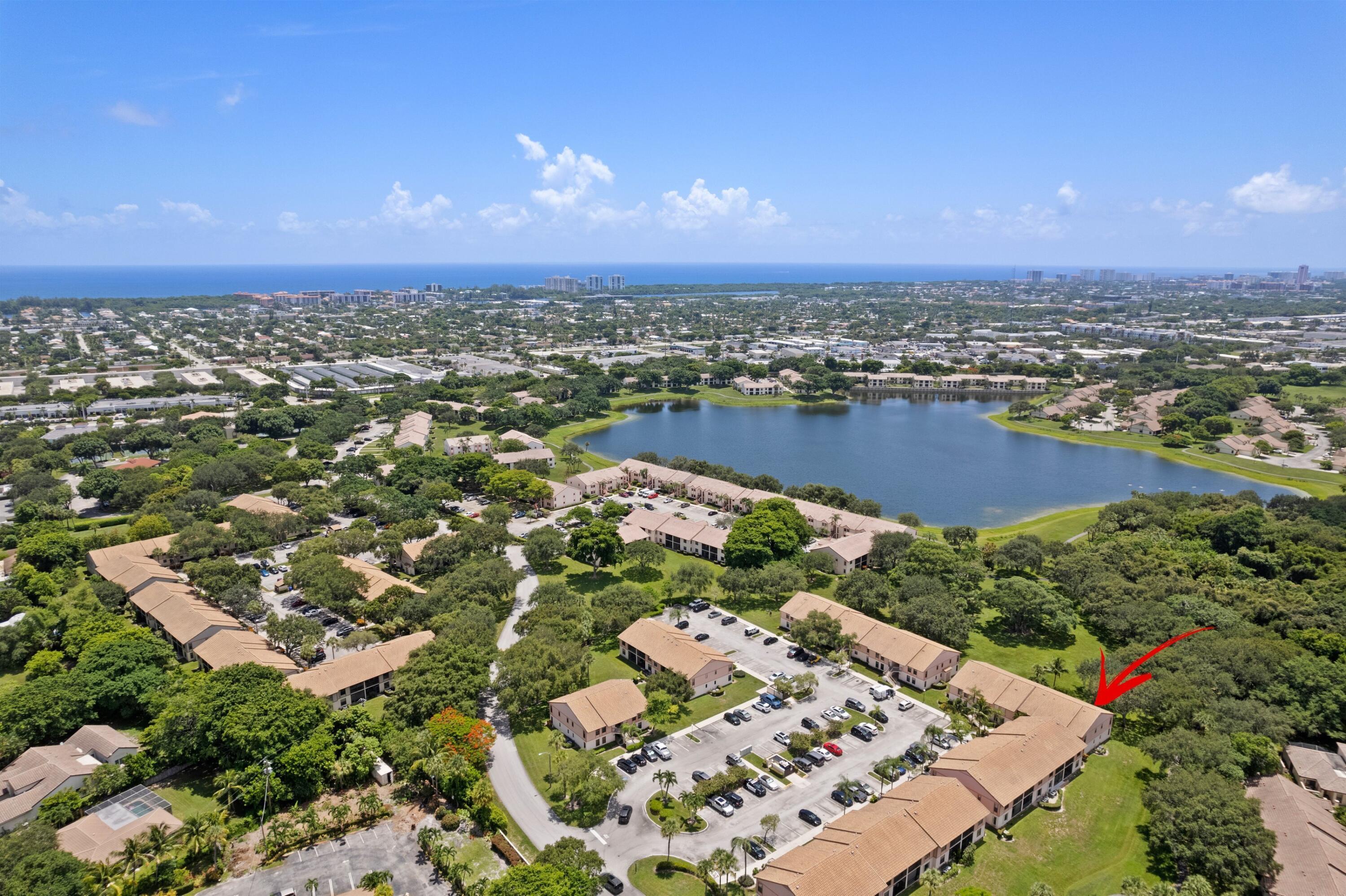 INVESTOR FRIENDLY, RENT RIGHT AWAY GORGEOUS CORNER END-UNIT CONDO IN PRESTIGIOUS LAKE WINDWOOD WITH BREATHTAKING LAKE VIEWS, BRAND NEW A/C UNIT, NEWER WATER HEATHER.  BIKE TO BEACH Bright Open Floor Plan | Impressive Vaulted Ceilings, LED Recessed Lighting, Eat-In Kitchen Breakfast Bar, Granite Countertop, S/S Appliances, Large Primary Bedroom with Walk-In Closet, Updated Glass Shower & Soaking Tub Large Covered Patio, Assigned & Guest Parking.  Prime East Boca Location, FAU, Downtown Mizner Park, Royal Palm Place & Delray Beach Atlantic Ave, Top A+ Rated School District, Resort-Like Amenities, 24/7 Manned Gate, 2 Pools, 2 Clubhouses, Tennis/Basketball/Racquetball Courts, Jog/Bike Trail, Dog Park, Picnic Area