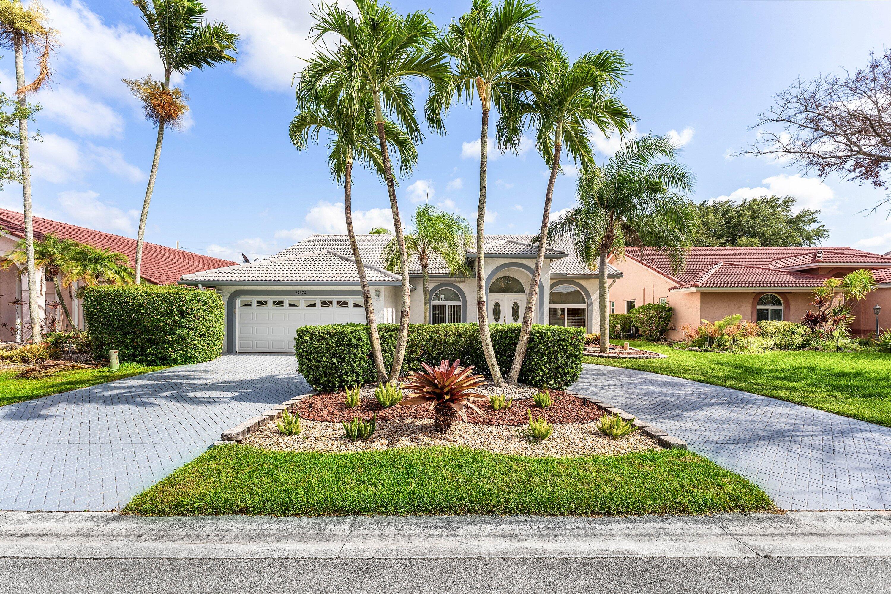 Paradise in the Isles of West Glen showcasing impeccable pride of ownership 5 Bdr/2.5 Ba River-front residence w/ circular driveway, IMPACT WINDOWS & DOORS, 2-Zone A/C. Breathtaking views of the Stranahan River from your Private Dock w/ Ocean Access.  Exceptional retreat for boating and watersports enthusiasts. Expansive lanai is the perfect setting to dine Al Fresco taking in spectacular crimson sunsets. Lavishly remodeled Chef's kitchen boasts Quartzite countertops flowing seamlessly into a spacious family room. Enormous Primary Bdr suite, Formal living & dining areas are ideal for both daily life & memorable holiday gatherings. Exquisitely renovated bathrooms w/ modern touches of refinement. Nearly 3000 sq. ft. of living space! Grow your family & make THIS your private Oasis!  A RATED SCHOOLS. Easy walk to houses of workship and Tephford Park. Convenient access to Sawgrass Expressway.