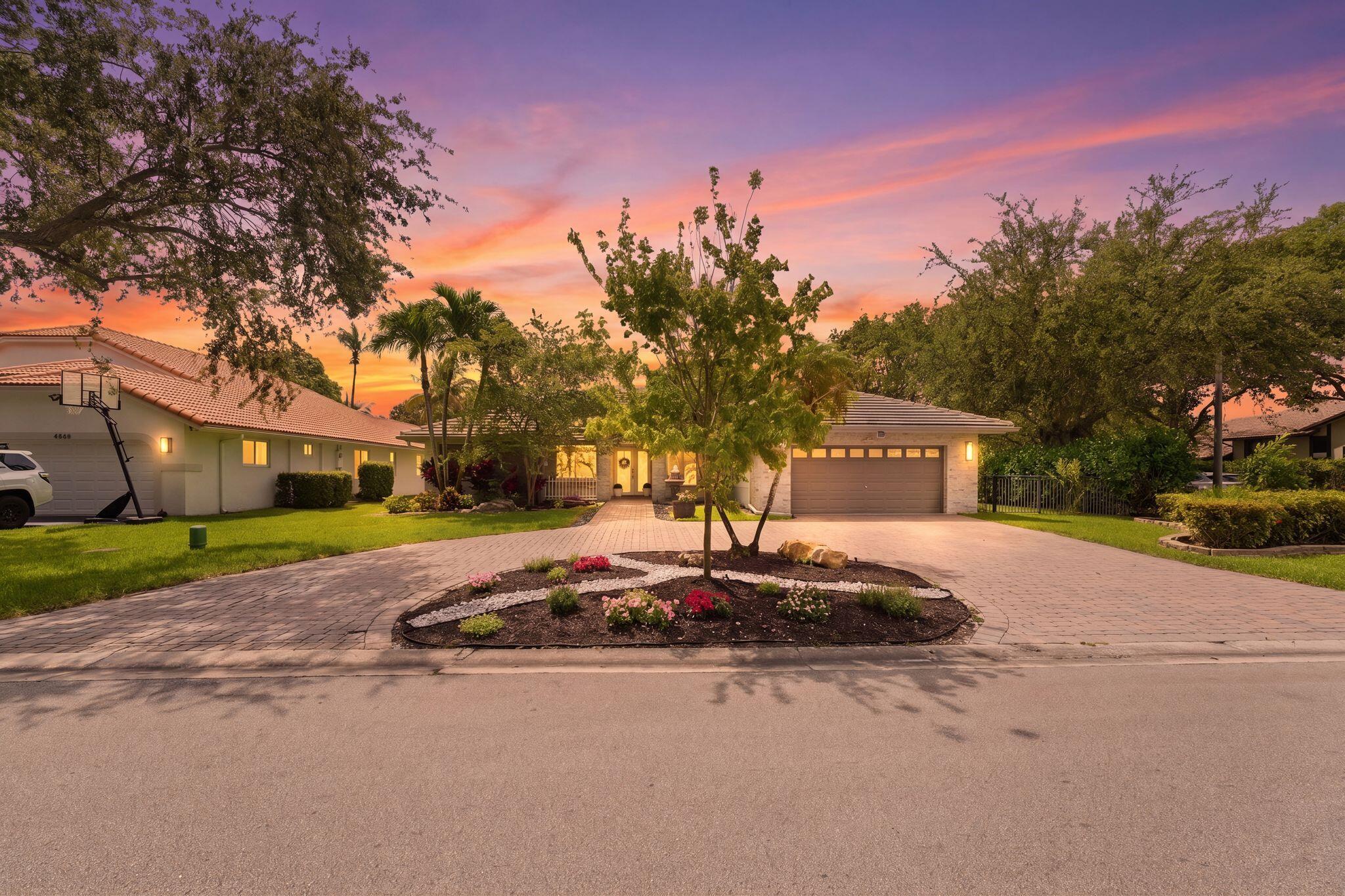 STUNNING 4 Bedroom + Office / 3 Bathroom CORNER LOT home with POOL & Water View in the highly sought out neighborhood of NORTH SPRINGS with NO HOA!! New Roof 2020, New AC 2024, 12ft Ceilings, Modern outdoor Stone Facade with a large circular driveway. Hurricane impacted garage and accordion shutters all through out the home. Amazing School district.