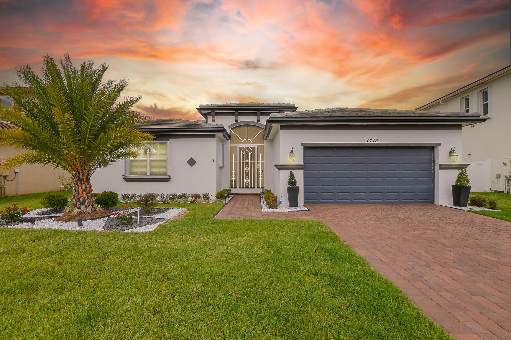 Live the Florida lifestyle in Copper Creek, a gated community with outstanding amenities. This well-designed home offers an open layout with a large great room and a bright kitchen with quartz countertops and a center island. The primary suite features tray ceilings and spacious walk-in closets. Tile floors enhance the main living areas, with wood flooring in all bedrooms. Enjoy outdoor living with a covered screened patio and a large 30' x 14' slab for entertaining. The home sits on one of the largest lots, overlooking a white-fenced yard. Accordion shutters on all openings allow for quick storm prep. Located within walking distance to the elementary school. Community features include a clubhouse, resort-style pool, fitness center, and more.