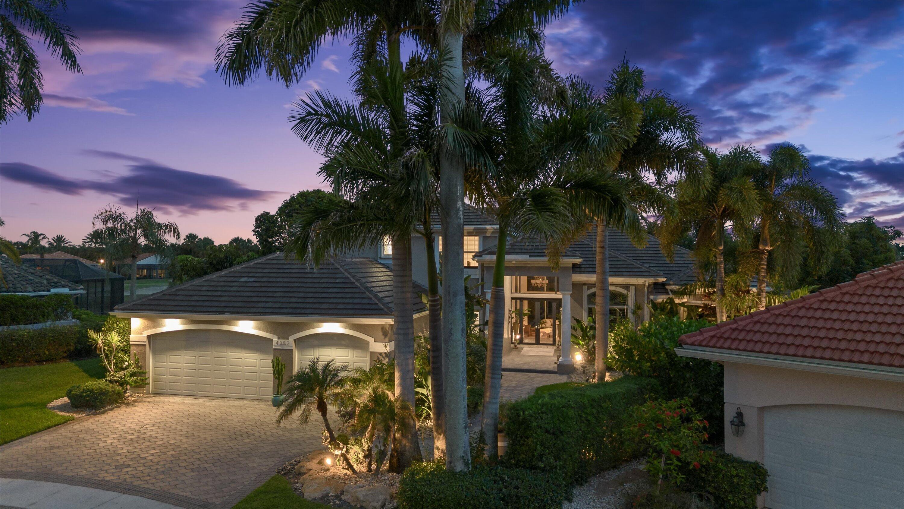 Welcome to one of Wycliffe's most extraordinary estate homes—a lushly landscaped true resort-style retreat with breathtaking water  and golf course views & frontage. This property is quite probably the finest home ever built in the community, with the added prestige of being in the highly sought-after James Court neighborhood.  The list of superlatives is endless, from its square footage to lot size, from pool size to ceiling heights, and so much more. Offering over 5,100 total square feet of beautifully designed living space, its size and scope will satisfy even the most discerning buyer. This exceptional residence features five spacious bedrooms, four full bathrooms, and two half baths.     In addition, a rare second-floor 1,000-square-foot suite of rooms provides the perfect space for visiting guests, a home office, or live-in assistants. Designed for both everyday comfort and superb entertaining, the home showcases a newly reimagined chef's kitchen with gas cooking, light-filled living spaces, and an ideal open layout. The first level primary suite wows with an expansive footprint, a grand Hollywood-style primary  bathroom, and the luxury of an en-suite living space. Step outside to your own private oasis featuring a huge refurbished pool protected by an expansive screened patio, and multiple outdoor entertaining areas  overlooking spectacular water and golf vistas. Recent updates completed since 2022 include a new roof and gutters, HWH, new AC systems, Japanese-style bidet toilets, and upgraded  LED ceiling lights throughout. A whole-house generator and mix of impact glass and accordion shutters add peace of mind.   Considered by many to be one of the best golf and country club values in Palm Beach County, Wycliffe offers not one but two championship 18-hole golf courses.  This, in addition to its recently completed $18+ million, beautifully executed clubhouse renovation, provides resident members with a wide array of dining options, advanced spa services, a state-of-the-art fitness center, an Olympic-sized swimming pool and sun area, numerous Har-Tru tennis and pickleball courts, and much more.  Wycliffe offers a wide range of properties, from smartly designed townhomes to exquisite larger-lot estates, located throughout its fourteen subsection communities, each with its distinct style and flavor.   The master HOA applicable to all communities provides for inclusive Comcast advanced fiber-optic cable service, phone, and high-speed internet, landscaping, security, including manned gates, roving patrols, on-site paramedic services, and more. There has never been a better time to make Wycliffe your home!