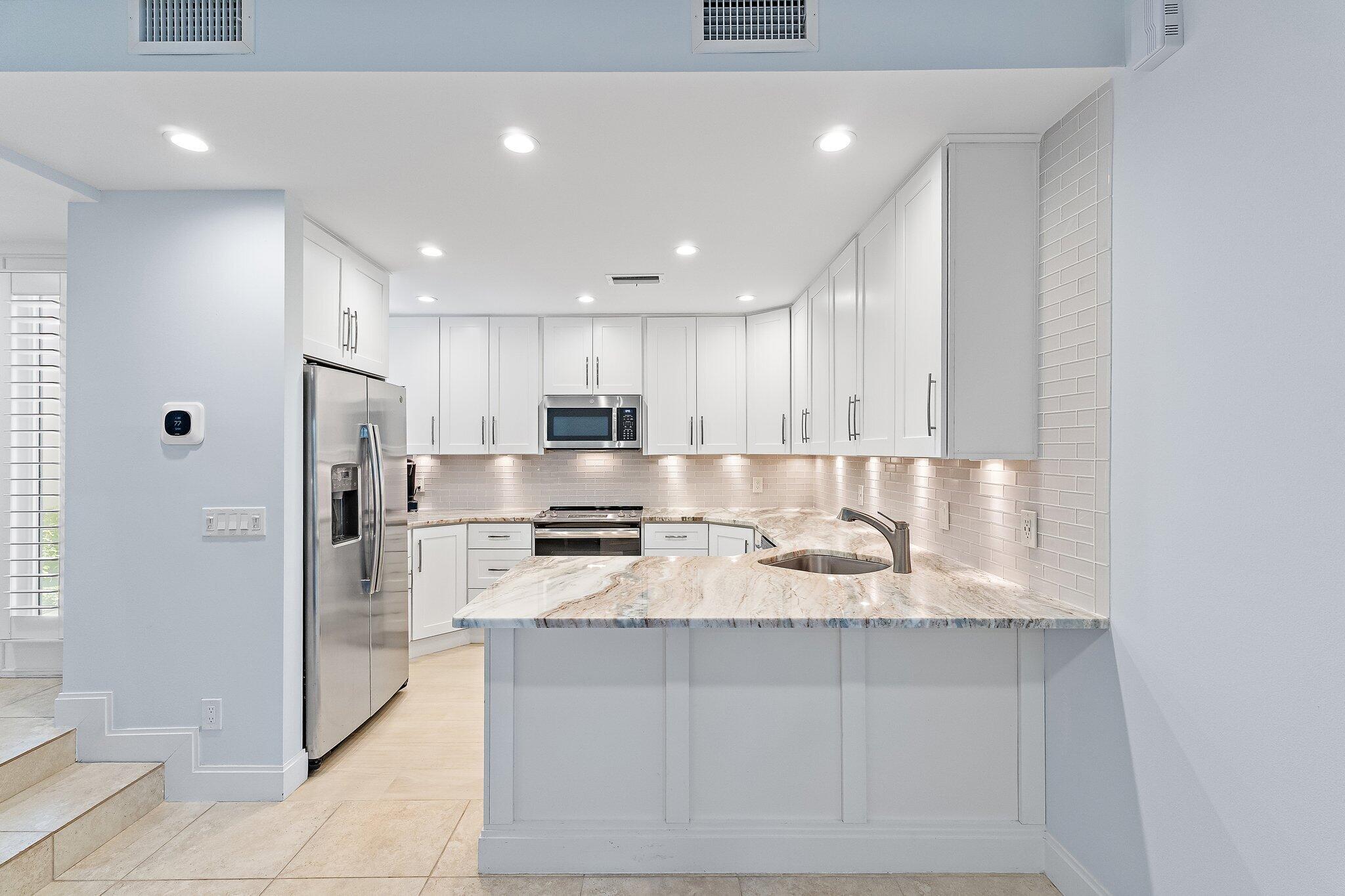 ESTUARY AT JUPITER DUNES CONDO - Residential