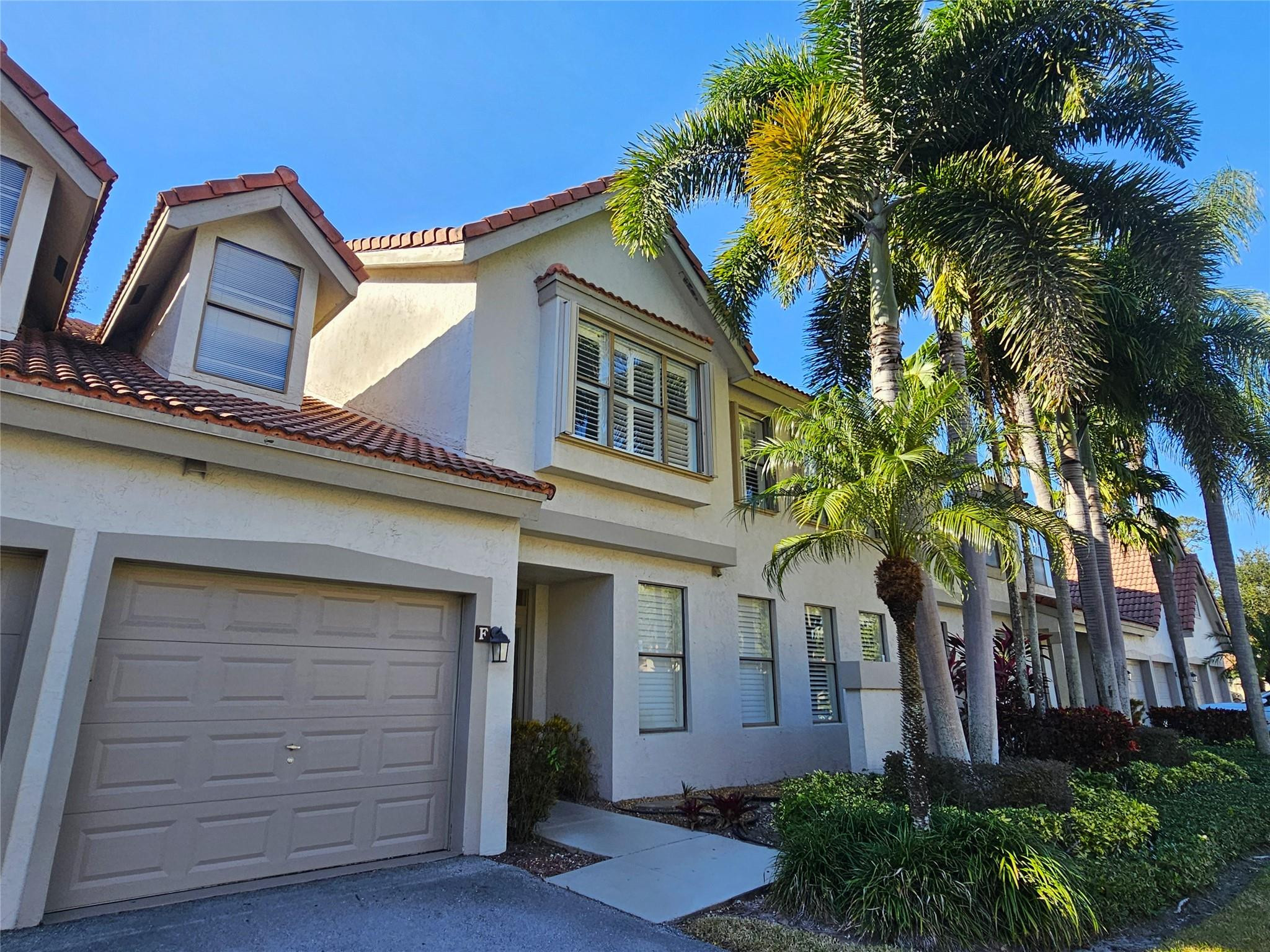 Beautiful second-floor condo in the highly sought after Coach Houses of Town Place II. This spacious unit features vaulted ceilings, an open kitchen, walk-in pantry, separate laundry room, and attached one-car garage. Abundant storage throughout adds convenience and functionality.  Enjoy a prime Boca Raton location just minutes from Town Center Mall, Publix, restaurants, shopping, and entertainment. Community amenities include two swimming pools.