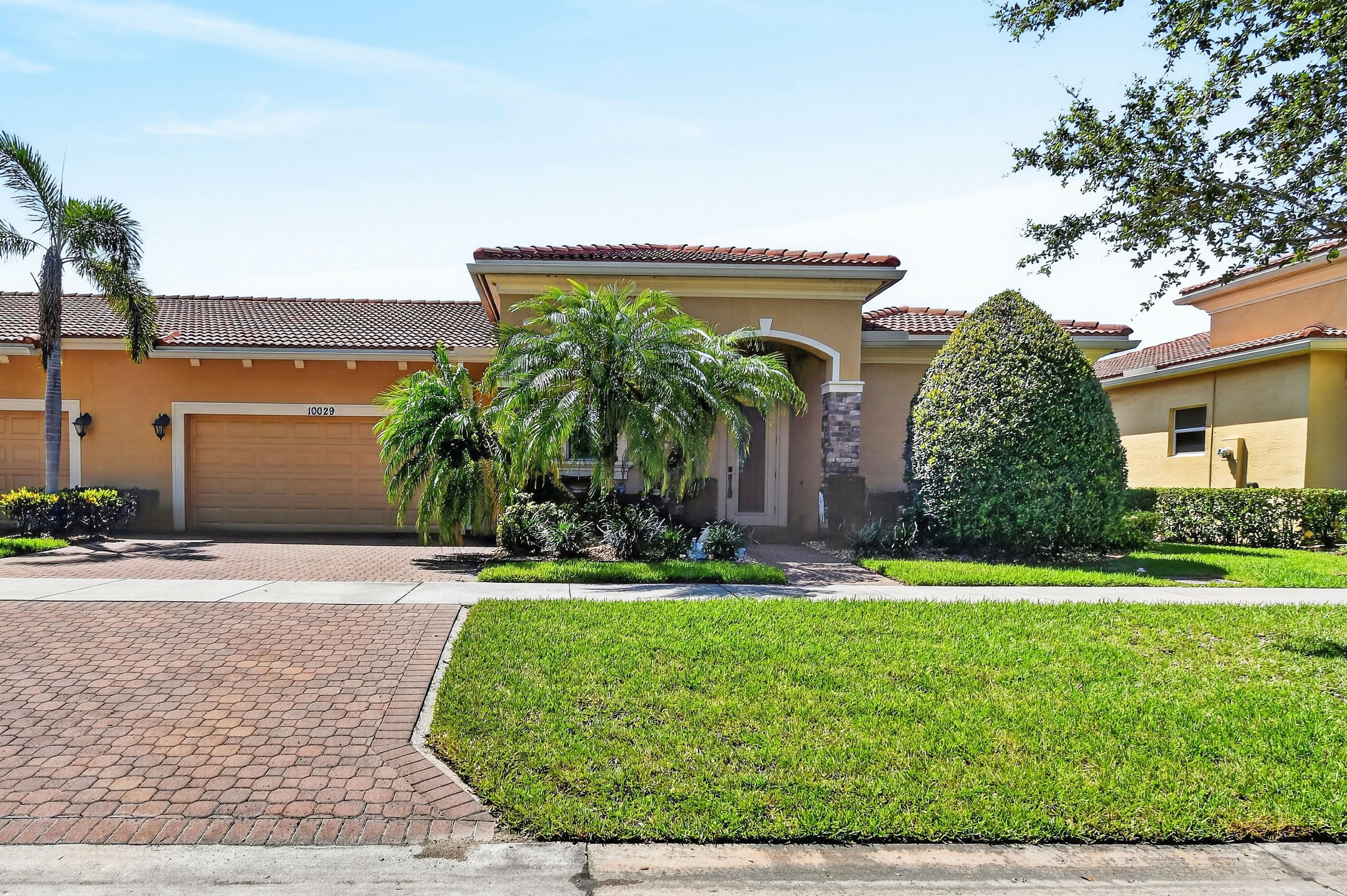 Meticulously maintained 2BR/2BA/2CG villa ideally located close to the community entrance and just a short walk to the clubhouse and resort-style amenities. Features include hurricane impact windows and doors, new A/C, new water heater, and newer appliances. The kitchen offers 42-inch dark wood cabinets, granite countertops, and a breakfast bar overlooking the open living and dining areas. Relax on the private screened patio or unwind in the spacious master suite featuring abundant closet space, a soaking tub, and separate shower. Enjoy an active lifestyle with pickleball, billiards, indoor and outdoor pools, fitness center, playground, dog park, scenic walking paths, and more!