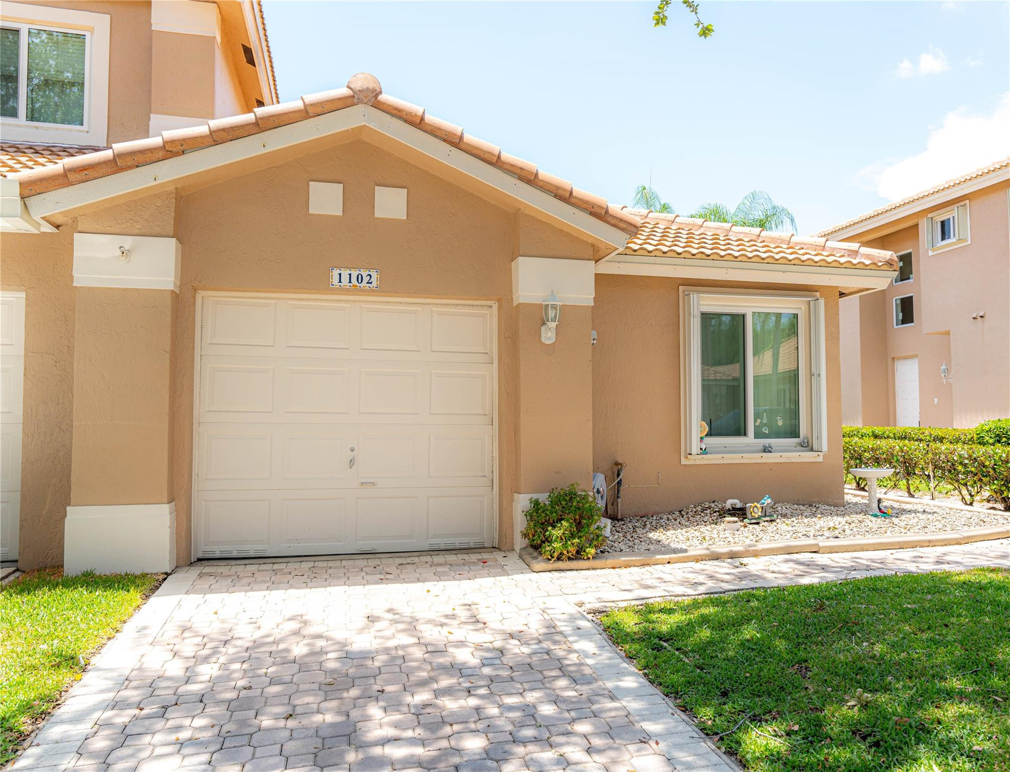 Welcome to this beautiful Grand Palms Golf Community! A spacious one story beautifully updated 3-bedroom 2-bath house located in the highly desirable Grand Palms Neighborhood. The house features a renovated kitchen, updated bathrooms, newer flooring, custom built-in closets, and is freshly painted throughout! New roof installed in 2023 and AC in 2019. Hurricane impact windows throughout as well as a private screened in patio. The HOA includes WIFI, Roof, HD Cable, Pool, Security, Lawn Care and more! This turnkey house is perfect for a family that wants to move in and enjoy their home on day one! A great location in Pembroke Pines close to great schools, shopping, and a hospital, all while nestled into a quiet private neighborhood.
