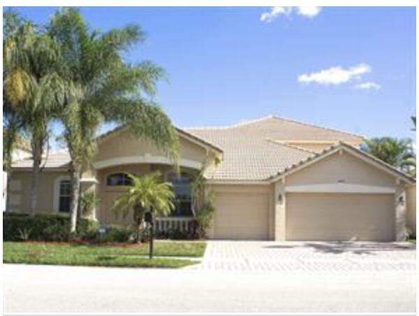 NEW ROOF! NEW IMPACT WINDOWS! NEW WATER HEATER, AC, SS APPLIANCES-- ALL 2025! UPGRADED POOL! This Luxurious 5-bedroom, 4-bath home-- a private resort with an upgraded screened pool and travertine deck overlooking a scenic lake. The first floor primary suite is totally private with direct access to the pool. A spacious kitchen with upgraded stainless steel appliances, including a gas range, has an island and bar seating. The guest suite has its own access to the pool and cabana bath. The upper level has a bedroom and bath along with 2 lofts--perfect for a home theater, study/office and/or game room. Hamilton Bay is a lovely gated community featuring a pool, fitness center, playground, clubhouse, tennis and basketball courts. A tranquil oasis--and convenient to shopping, dining and beaches!