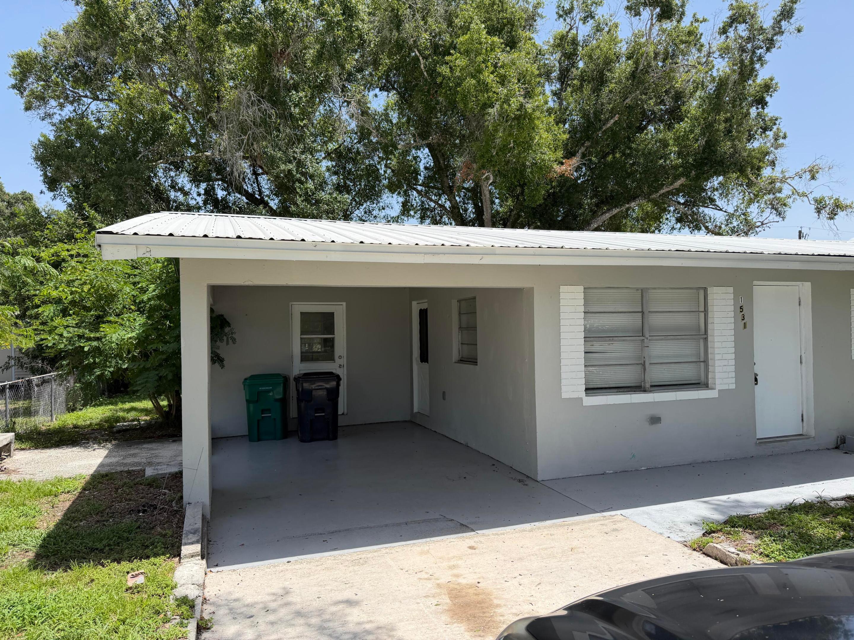 Welcome home to this charming 3-bedroom, 1-bath residence in Okeechobee, offering comfort, convenience, and recent updates. Featuring a newer metal roof for added durability and peace of mind, this home is move-in ready with fresh interior paint and easy-to-maintain tile flooring throughout.  The kitchen comes equipped with stainless steel appliances, making meal preparation a breeze, while the attached carport provides covered parking and additional storage options. Whether you're a first-time homebuyer, looking to downsize, or searching for an investment property, this home offers exceptional value.  Conveniently located near shopping, dining, schools, and all that Okeechobee has to offer, this property is ready for its next owner. Schedule your private showing​​‌​​​​‌​‌​​​‌‌​​​‌‌‌​​‌​​‌‌​​​​ today!
