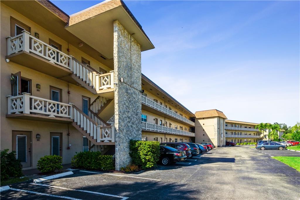 Enjoy beautiful gardens from this charming 1 bedroom, 1 bath, 2nd-floor condo. Enjoy daily strolls in the gardens, around the many ponds, over the footbridges, around the pool, and to the clubhouse. Let the vibrancy of nature fill your spirit! This condo features tile floors throughout, great natural light, and an enclosed balcony that is large enough for an added living area or a guest room. The building has completed its 40-year inspection, and the roof was replaced in 2019. This is a 55+ community per the association. 650 minimum credit score and $35,000+ income is required. No rentals for 2 years of ownership then only one time per year for a maximum of 6 months. This community is centrally located with easy access to transportation, hospital, shopping, banking etc.