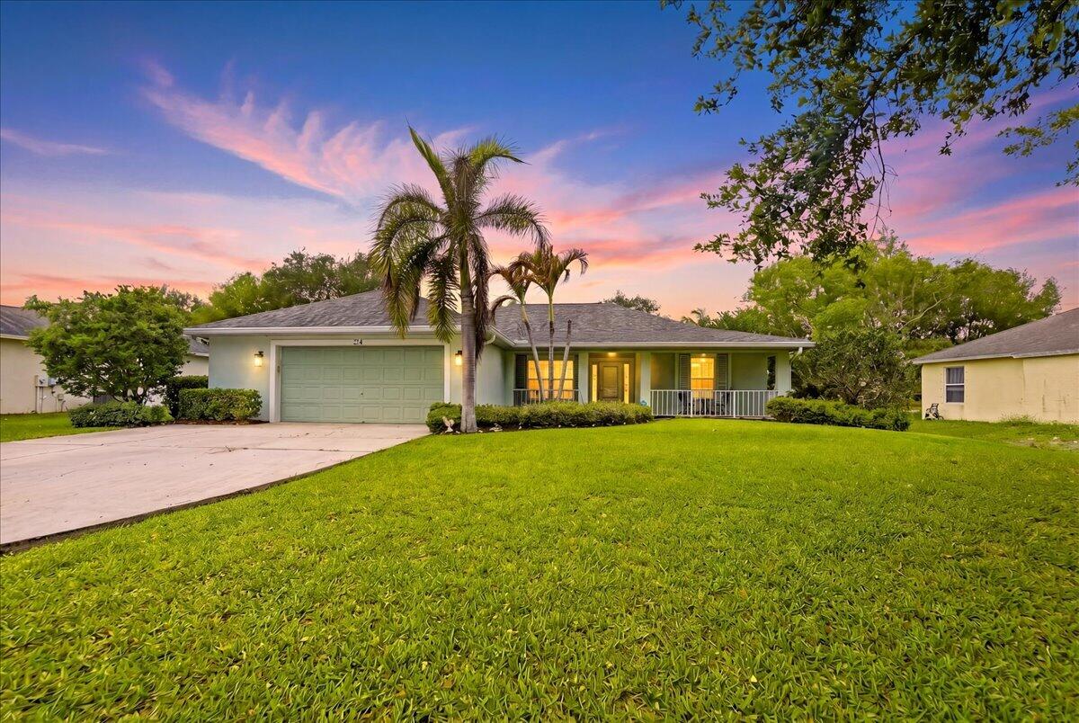 Step into this beautifully maintained 3-bedroom, 2-bathroom CBS home featuring a private pool and inviting living spaces designed for comfort and entertaining. Nestled just off Becker Road, the property offers easy access to I-95 and the Turnpike, ideal for commuters. The home highlights modern upgrades including  upgraded bathrooms  and extra wide garge, Newer luxury vinyl flooring, wide baseboards, plantation shutters, and a freshly painted interior. Stay cool with a newer A/C (2020), enjoy a recently replaced roof, and take advantage of smart home conveniences such as remotely controlled garage door and A/C via a smartphone app. The fully fenced backyard provides a spacious patio perfect for gatherings, while an RV hookup adds versatility.