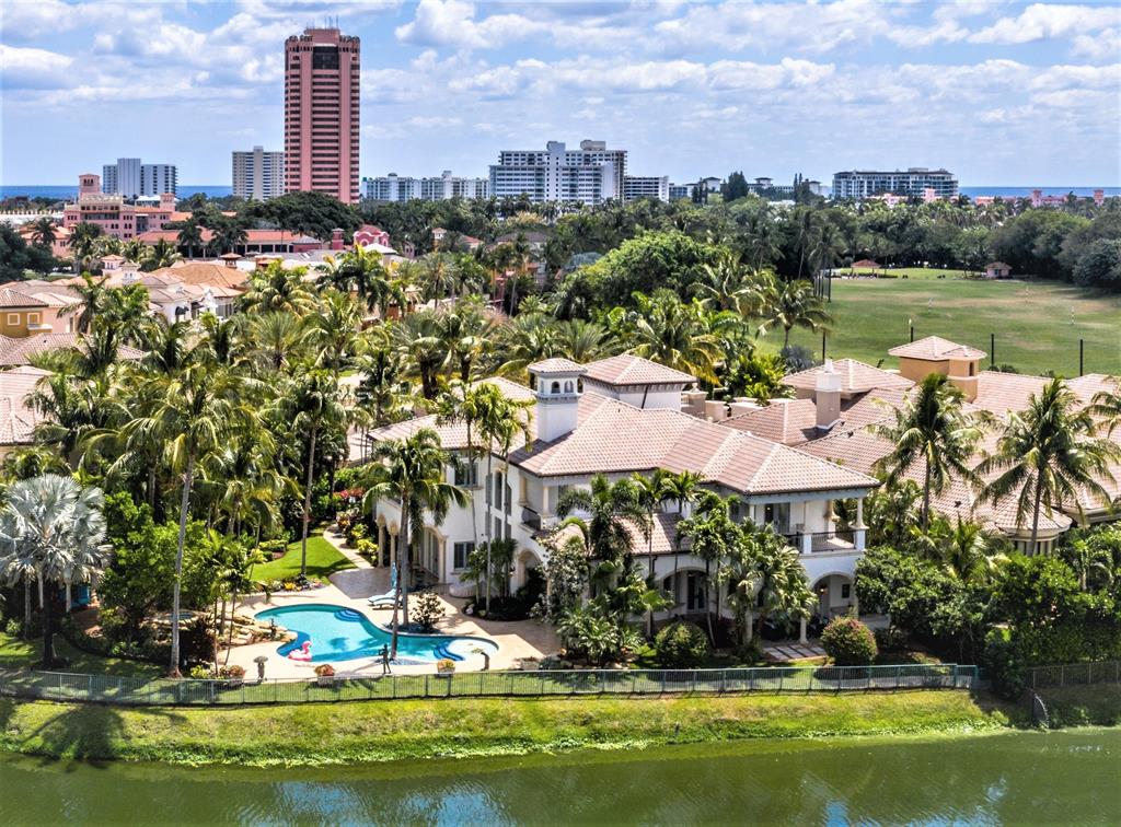 Sited on OVER 1/2 Acre on the grounds of the Internationally renowned BOCA RATON RESORT & CLUB, a Waldorf Astoria Resort, in the Luxurious Private, Guard Gated Enclave of Mizner Lake Estates. 313 Mizner Lake Estates Drive is an extraordinary estate encompassing over 9,709 total sq/ft. Featuring 4 spacious en-suite bedrooms, 7 indulgent baths, an elevator, full house generator, impact windows, and a gated motor court w/ 3-car garage, this two-story residence offers opulent living with the sophisticated leisure and amenities of the Boca Resort at your fingertips.  With over 200' of lake and fairway frontage, you will enjoy gracious resort-style outdoor living spaces that cater to grand-scale entertainment with tropical grounds landscaped to perfection! The written and verbal information provided including but not limited to prices, measurements, square footages, and lot sizes have been obtained and conveyed from third party sources. The Sellers and Listing Company expressly disclaim any warranty or representation regarding all information. Prospective purchasers shall not rely on any written or verbal information provided when entering a contract for sale and purchase. In the event a Buyer defaults, no commission will be paid to either Broker on the Deposits retained by the Seller. "No Commissions Paid until Title Passes."