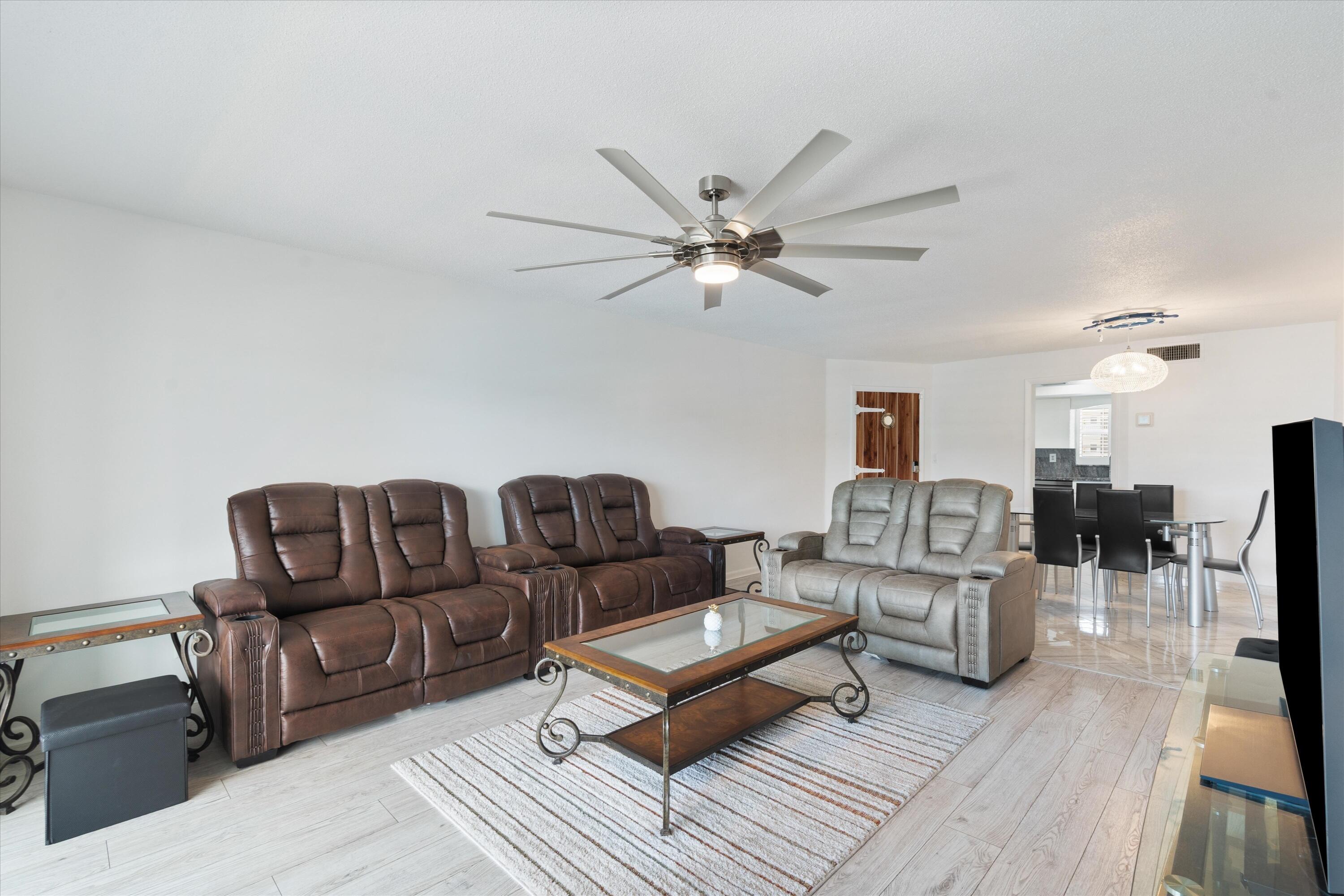 Prime Waterfront Condo in North Palm Beach Condo Features Experience waterfront living in this inviting condo, which offers 2 bedrooms and 2 bathrooms situated directly on the intracoastal in the desirable North Palm Beach area. The all-ages building boasts a spacious living area, perfect for both relaxing and entertaining. Step out onto the large patio to enjoy sweeping water views, creating a serene atmosphere right at home. The condo is designed for convenience with an in-unit washer and dryer, and the master bedroom includes a custom walk-in closet for ample storage. The kitchen features newer black stainless appliances that combine style and functionality. Comes Furnished or remove, allowing you to personalize the space to your needs. All Appliances are from 2019/2020  Roof 1/2025 Seller motivated .....Ideal Location and Amenities Perfectly located near scenic Peanut Island, Munyon Island, and some of Florida's finest beaches, this condo offers easy access to outdoor adventures and relaxation. You'll also be close to fine dining, shopping venues, and beautiful parks, providing a vibrant lifestyle just moments from your door. This building is also investor-friendly. Leasing - Max Times Per Year: 1; Leasing - Minimum Number of Days: 90 . The unit includes one deeded parking space and one open parking space plus for your convenience there is plenty of guest parking for visitors. Dock isn't included with property. Docks are first come, first served and NO DOCK renting is allowed. Dock available now or within three months.