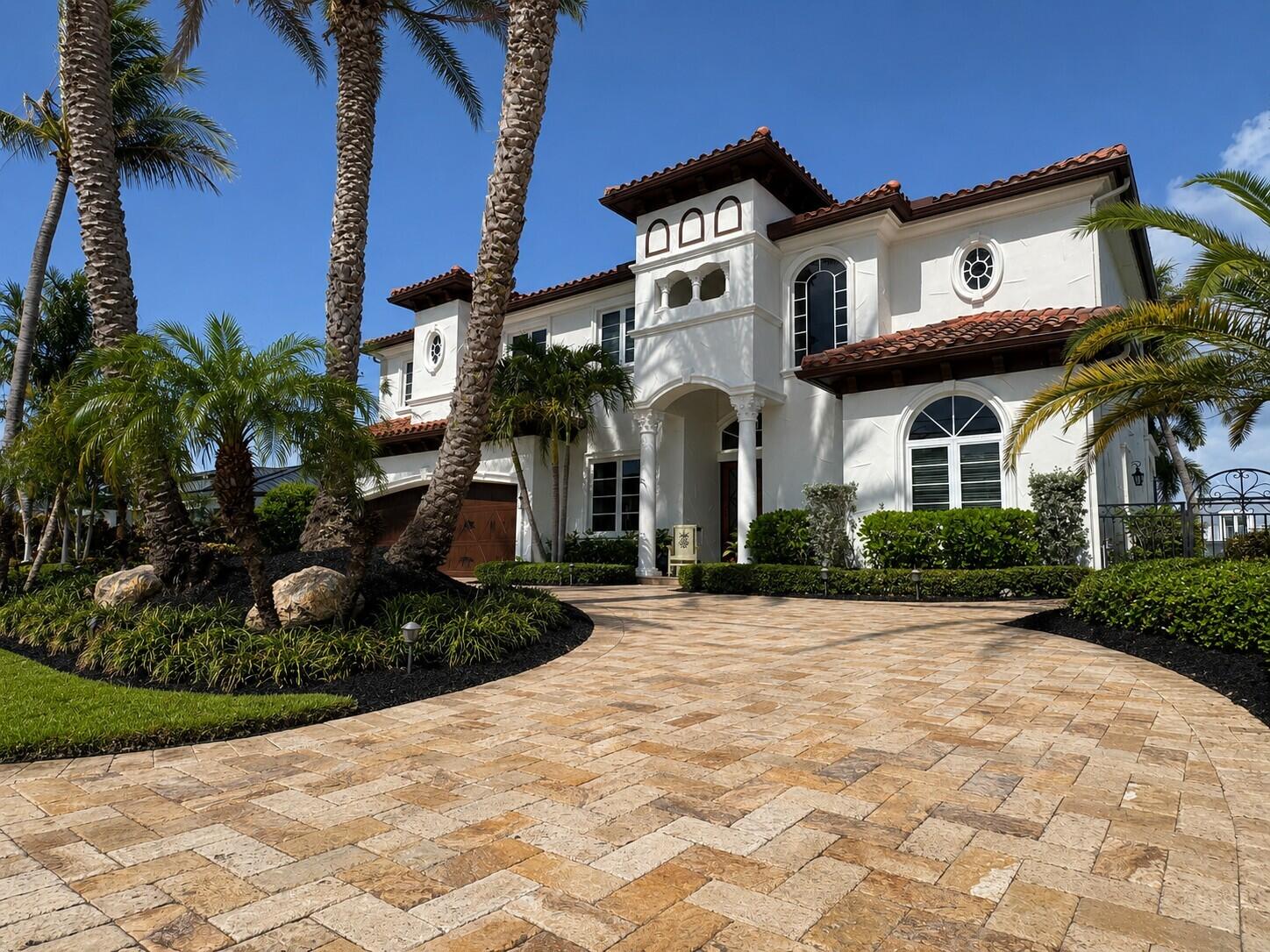 Experience exceptional waterfront living in prestigious Lighthouse Point. This 6-bedroom, 5-bath estate is ideally positioned on one of the area's widest deep water canals, offering 90+ feet of dockage, no fixed bridges, and direct ocean access. Enjoy expansive water views, outstanding yacht maneuverability, and a true boater's lifestyle. The home features spacious living areas, elegant finishes, a resort-style pool, and private dockage for large vessels. A rare opportunity to own on one of Lighthouse Point's most sought-after waterfront locations.